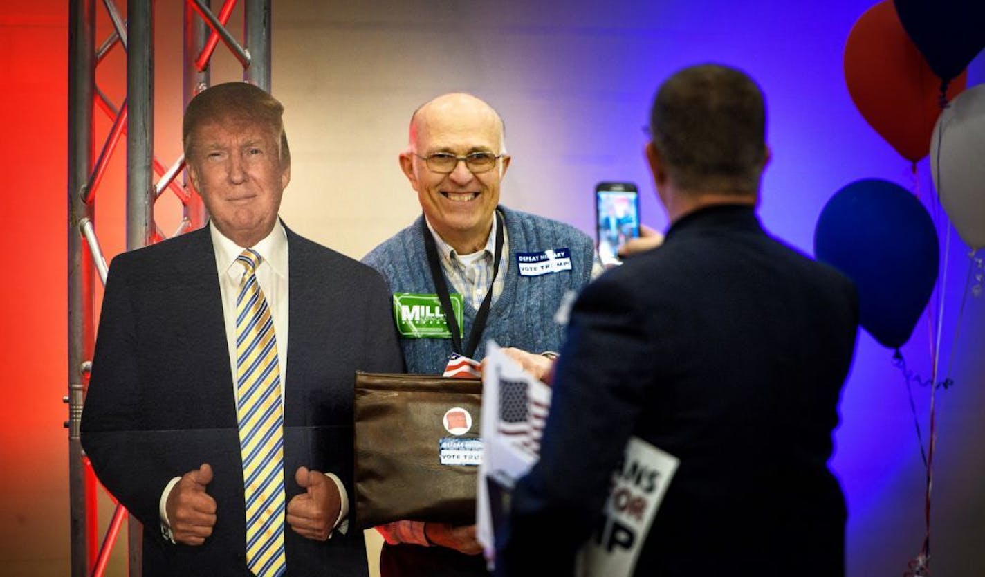 Trump supporter Jim Evenson posed for a photo with his candidate at the state GOP convention in Duluth on May 21. Two weeks before the party's national convention, Trump does not yet have any paid operatives in Minnesota.