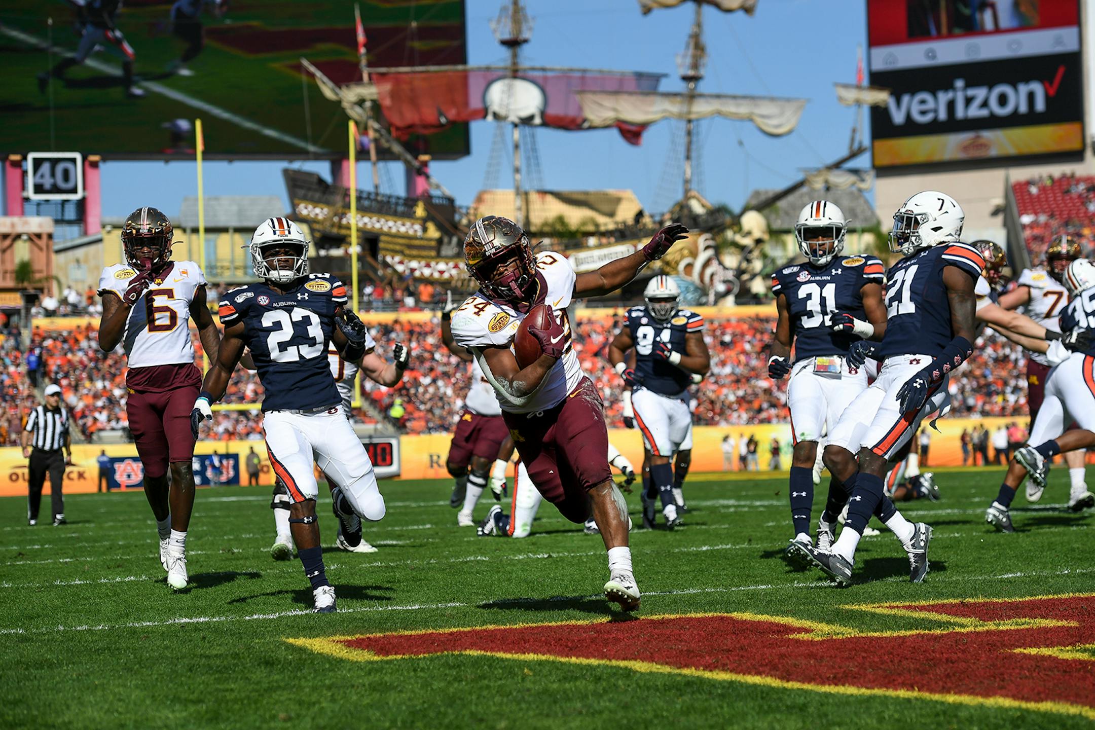 Minnesota Gophers running back Mohamed Ibrahim (24) rushed the ball for a touchdown in the first quarter against the Auburn Tigers.