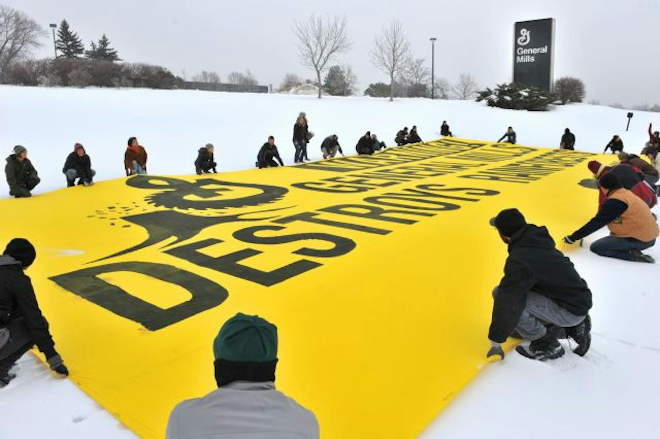Forty two activists with Rainforest Action Network, unfurled a 30 x 70 ft. banner reading �Warning: General Mills Destroys Rainforests� outside of the company�s Minneapolis headquarters building. General Mills uses palm oil in many of its products. The activists want General Mills to use palm oil produced in a socially and environmentally responsible manner. Production of palm oil has risen significantly in recently and palm oil plantations are expanding rapidly into the tropical forests of Indo