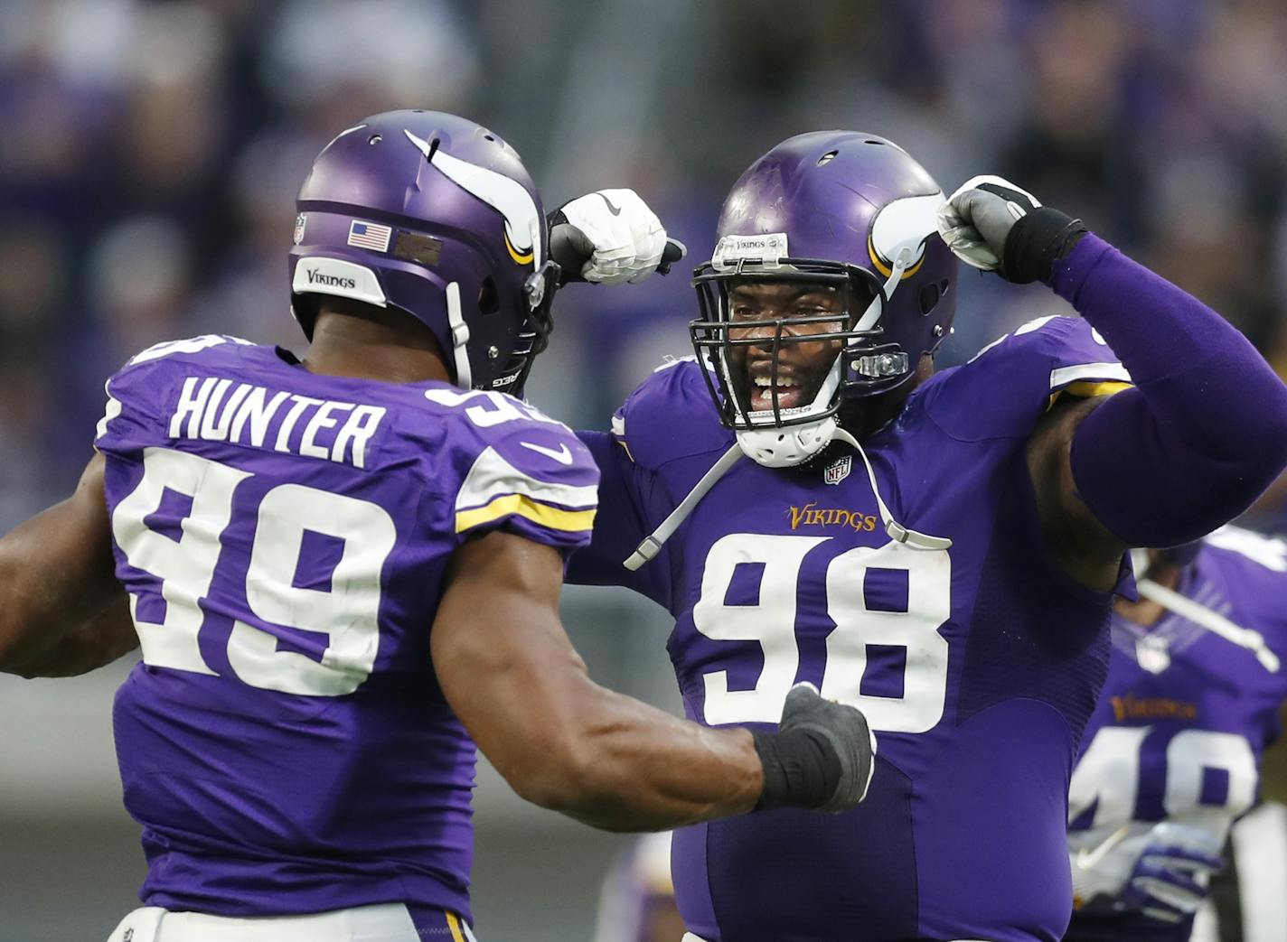 Minnesota Vikings defensive end Danielle Hunter (99) left celebrated his last sack of the game over Arizona Cardinals quarterback Carson Palmer (3) with defensive tackle Linval Joseph (98) to seal the game 30-24 at US Bank Stadium Sunday November 20, 2016 in Minneapolis MN. ] The Minnesota hosted the Arizona Cardinals Jerry Holt / jerry. Holt@Startribune.com