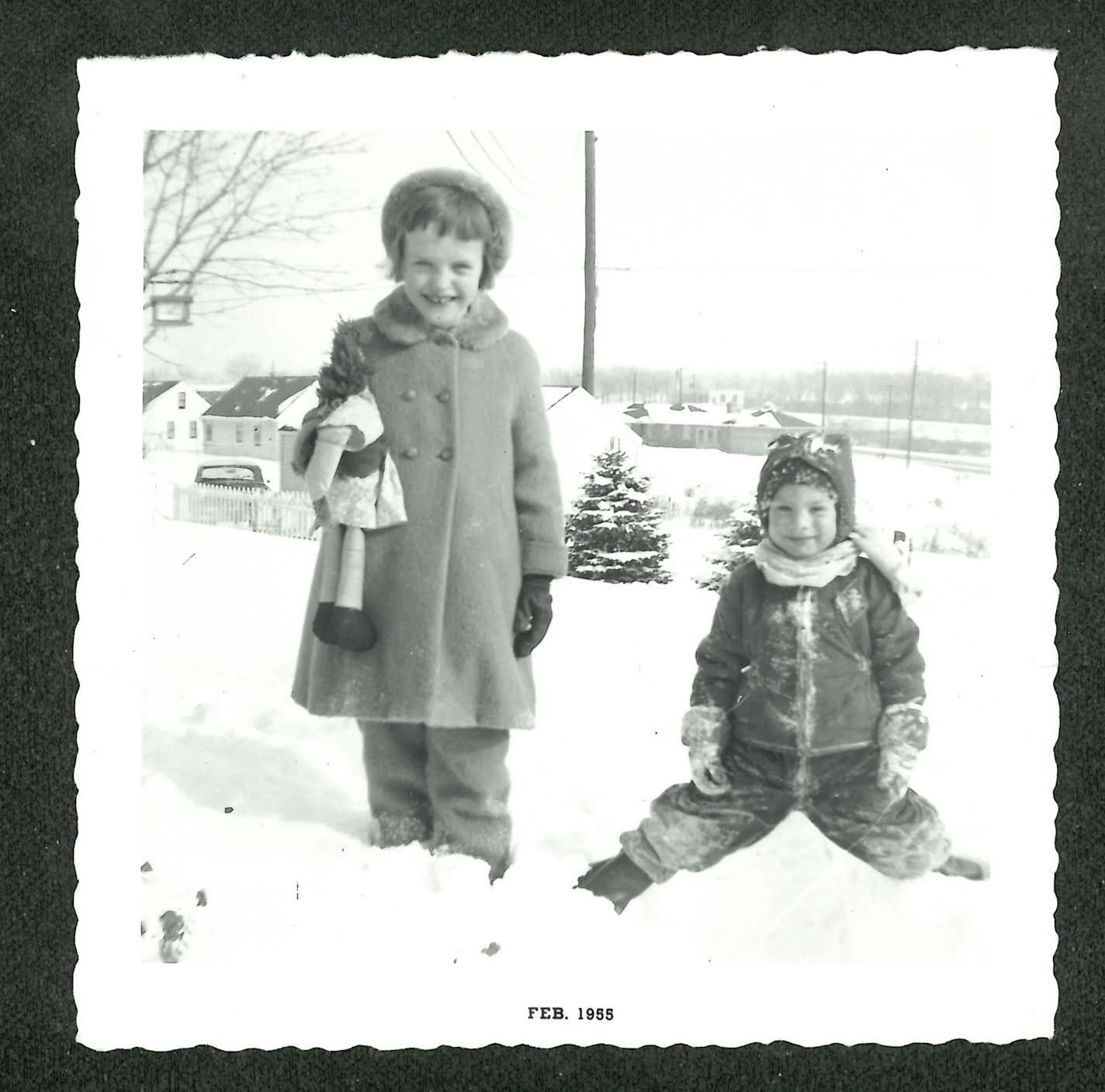 Janet Lee Dahl playing with her neighbor "Mark."
1955
A discarded photo album discovered in a southern California flea market reveals the short life of a Minneapolis girl in the 1950s, and her mother's determination to document it.