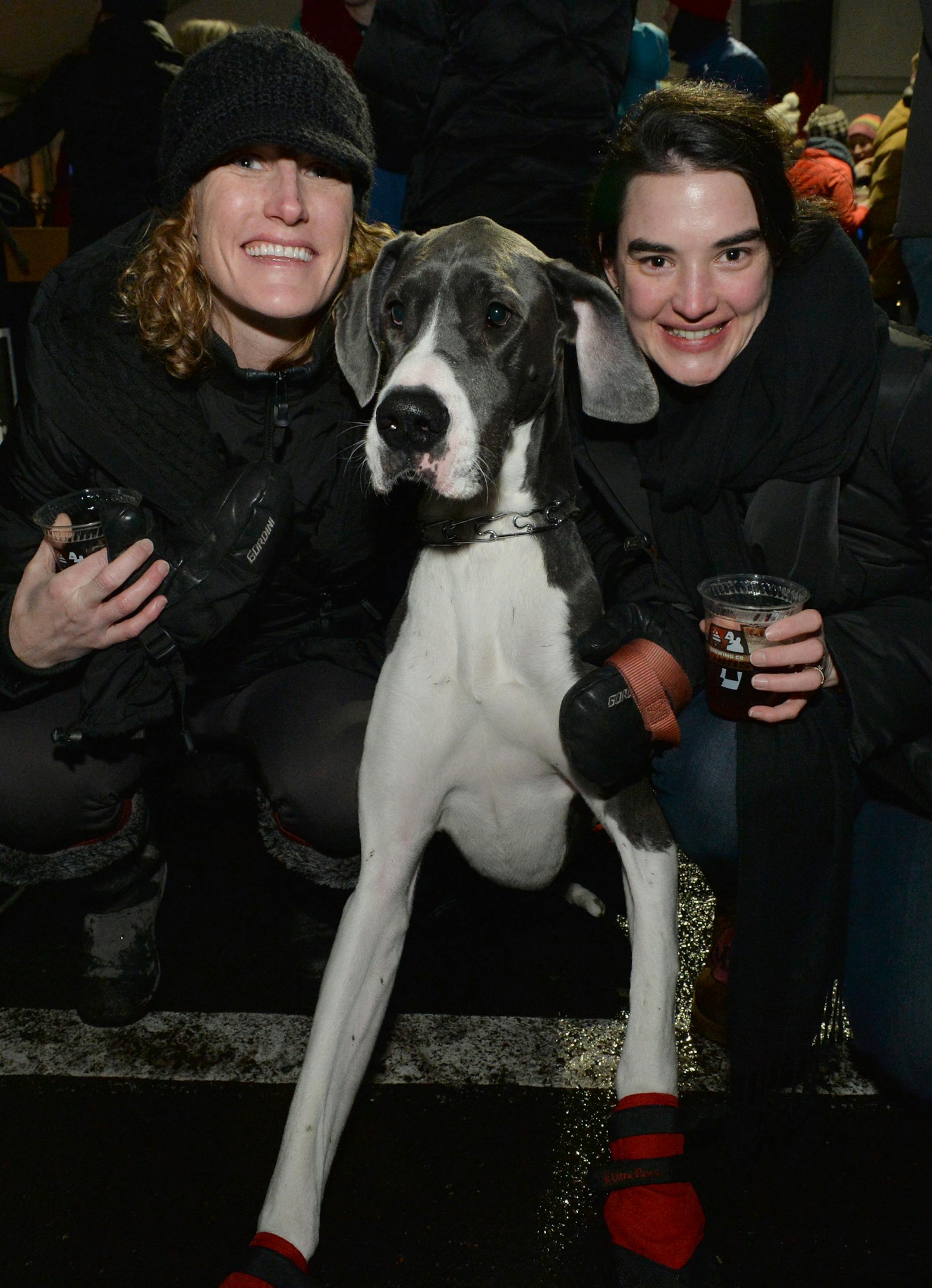 Monica Osterholm (left), Norman (center) and Eloise Ratan in the Big Tent at the post-luminary party. ] (SPECIAL TO THE STAR TRIBUNE/BRE McGEE) **Monica Osterholm (left), Norman (center, dog), Eloise Taran (right)