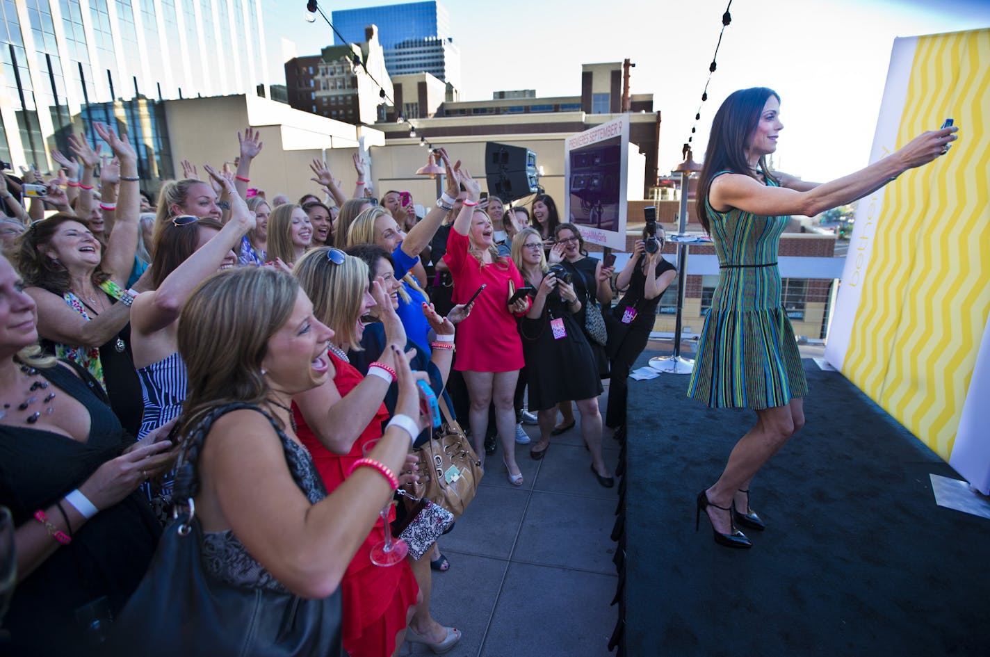 Bethenny Frankel, right, took a "selfie" photograph of herself with the crowd during a private meet and greet at the Union Restaurant in downtown Minneapolis, Minn. on Wednesday, August 7, 2013 to promote her new Fox show Bethenny premiering on September 9. ] (RENEE JONES SCHNEIDER &#x2022; reneejones@startribune.com)