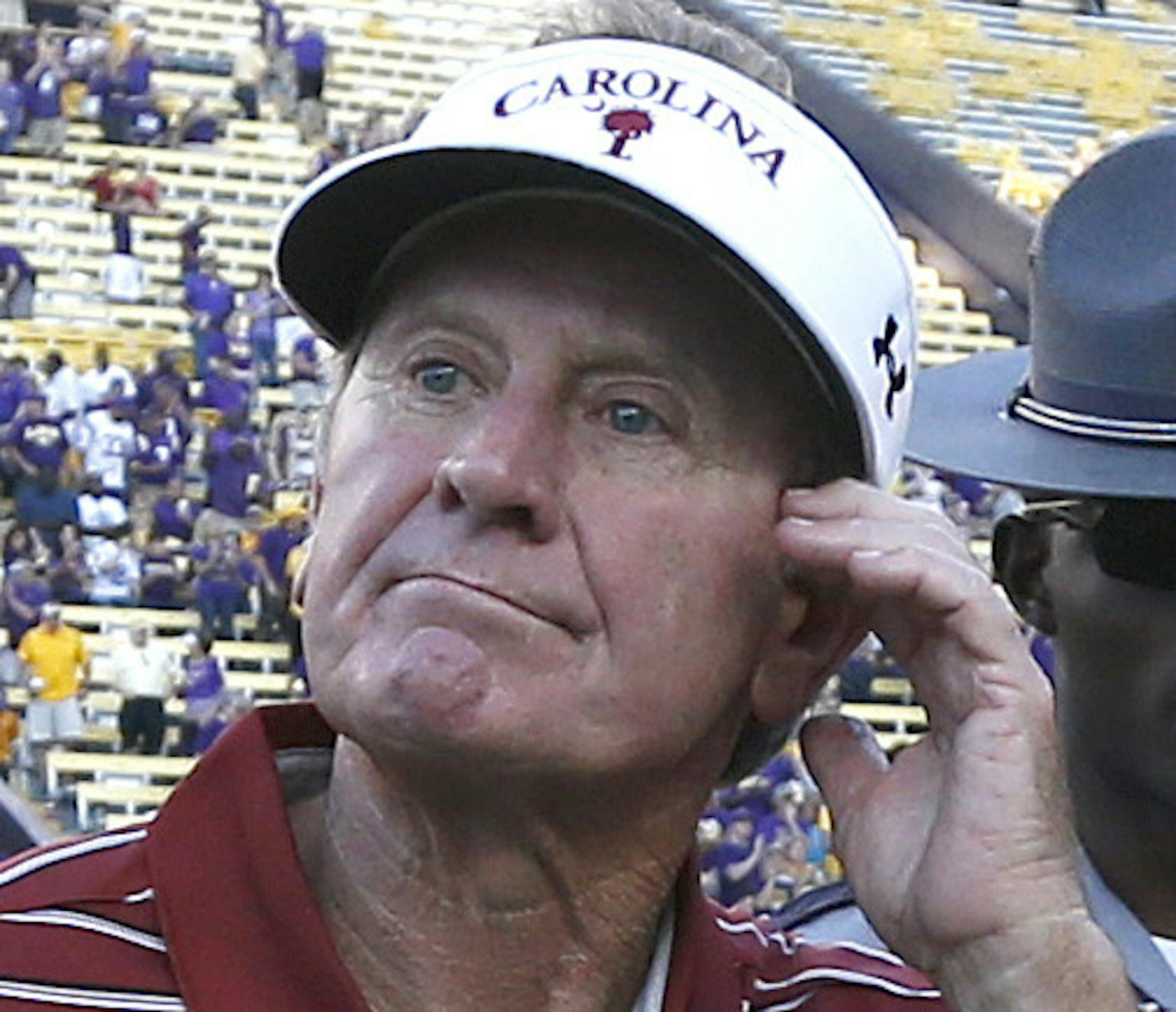 South Carolina head coach Steve Spurrier walks across the field after an NCAA college football game against LSU in Baton Rouge, La., Saturday, Oct. 10, 2015. LSU won 45-24. (AP Photo/Jonathan Bachman)