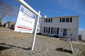 A Coldwell Banker Burnet sign is shown in St. Louis Park in this file photo from March 2015. (Staff photo by Elizabeth Flores/Star Tribune) ORG XMIT: 