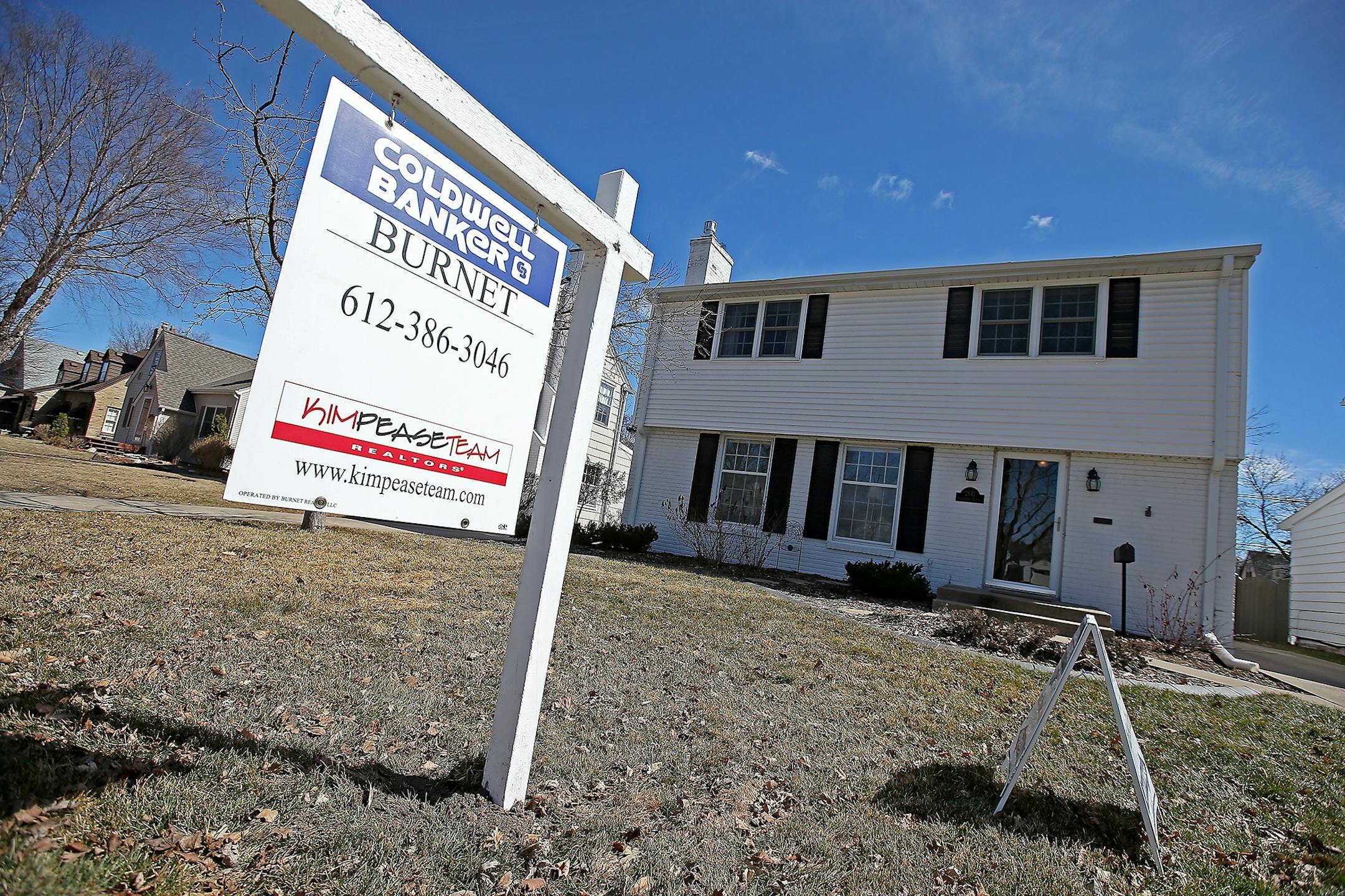 A Coldwell Banker Burnet sign is shown in St. Louis Park in this file photo from March 2015. (Staff photo by Elizabeth Flores/Star Tribune) ORG XMIT: MIN1503311334371338