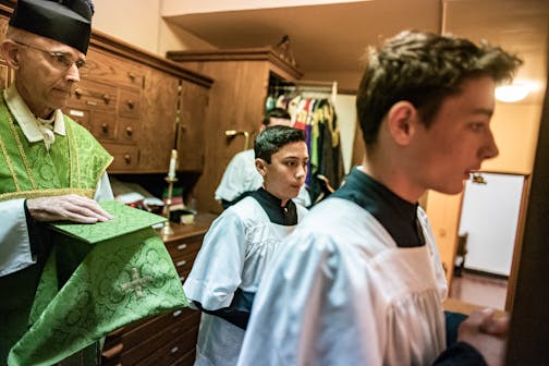 In South St. Paul, Minnesota on September 6, 2021, at St. Augustine Church, Father Robert Grabner headed into the Sacristy with the four altar boys. ] Pope Francis has said the growing expansion of the Latin Mass is being "exploited to widen the gaps'' among Catholics and "expose her to the peril of division." The Pope announced in July that he would limit these Masses, which have become a mecca for conservative Catholics. RICHARD TSONG-TAATARII • richard.tsong-taatarii@startribune.com