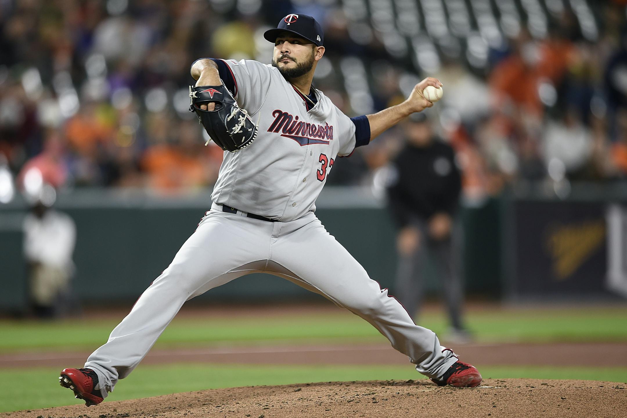 Minnesota Twins pitcher Martin Perez delivers against the Baltimore Orioles in the first inning of the second game of a baseball doubleheader, Saturday, April 20, 2019, in Baltimore.