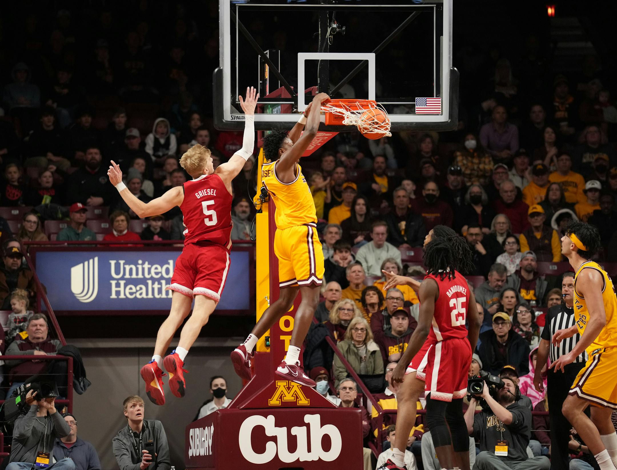 Minnesota Golden Gophers forward Joshua Ola-Joseph (1) gets a slam dunk past Nebraska Cornhuskers guard Sam Griesel (5) in the second half.