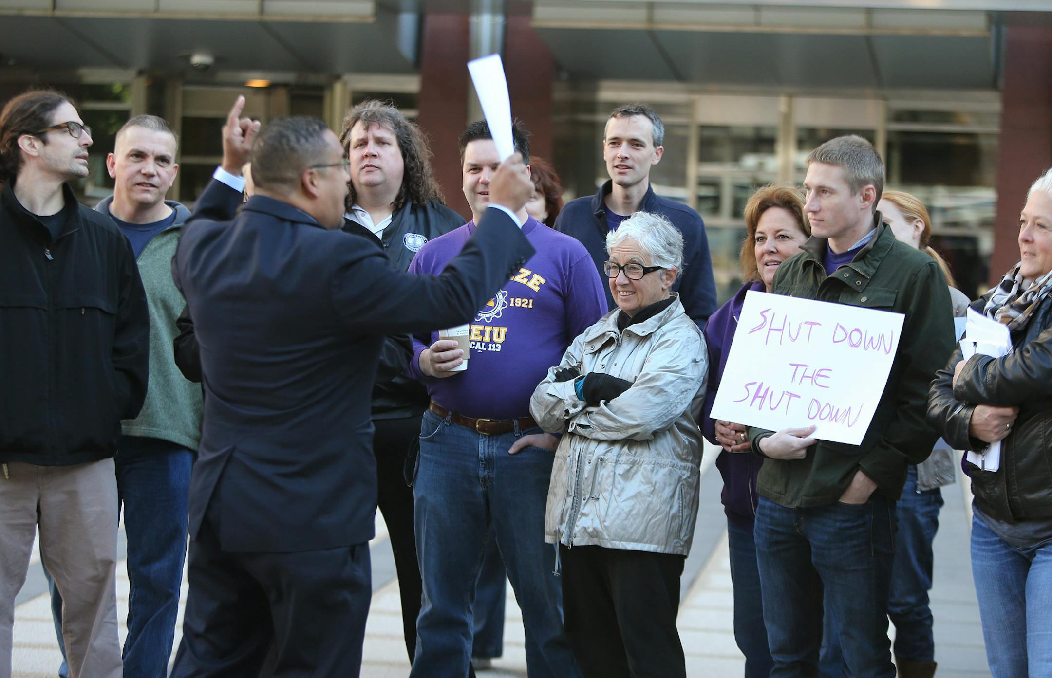 Representative Keith Ellison (D-MN) held a rally with some furloughed workers in front of the Federal Courthouse, Monday, October 7, 2013 in downtown Minneapolis, MN.(ELIZABETH FLORES/STAR TRIBUNE) ELIZABETH FLORES &#x2022; eflores@startribune.com