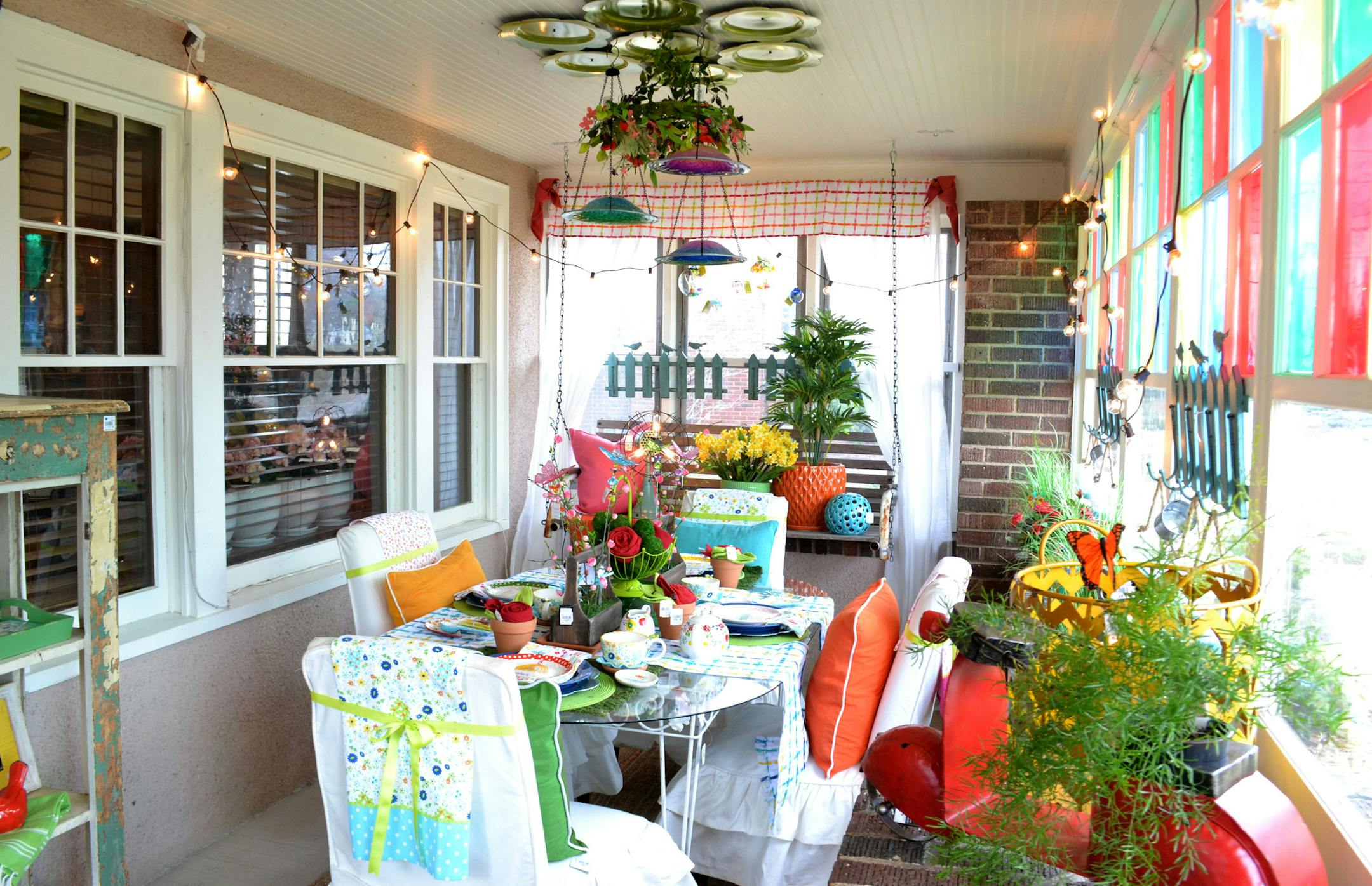 Garden-inspired primary color palette and fresh greens in the front porch.