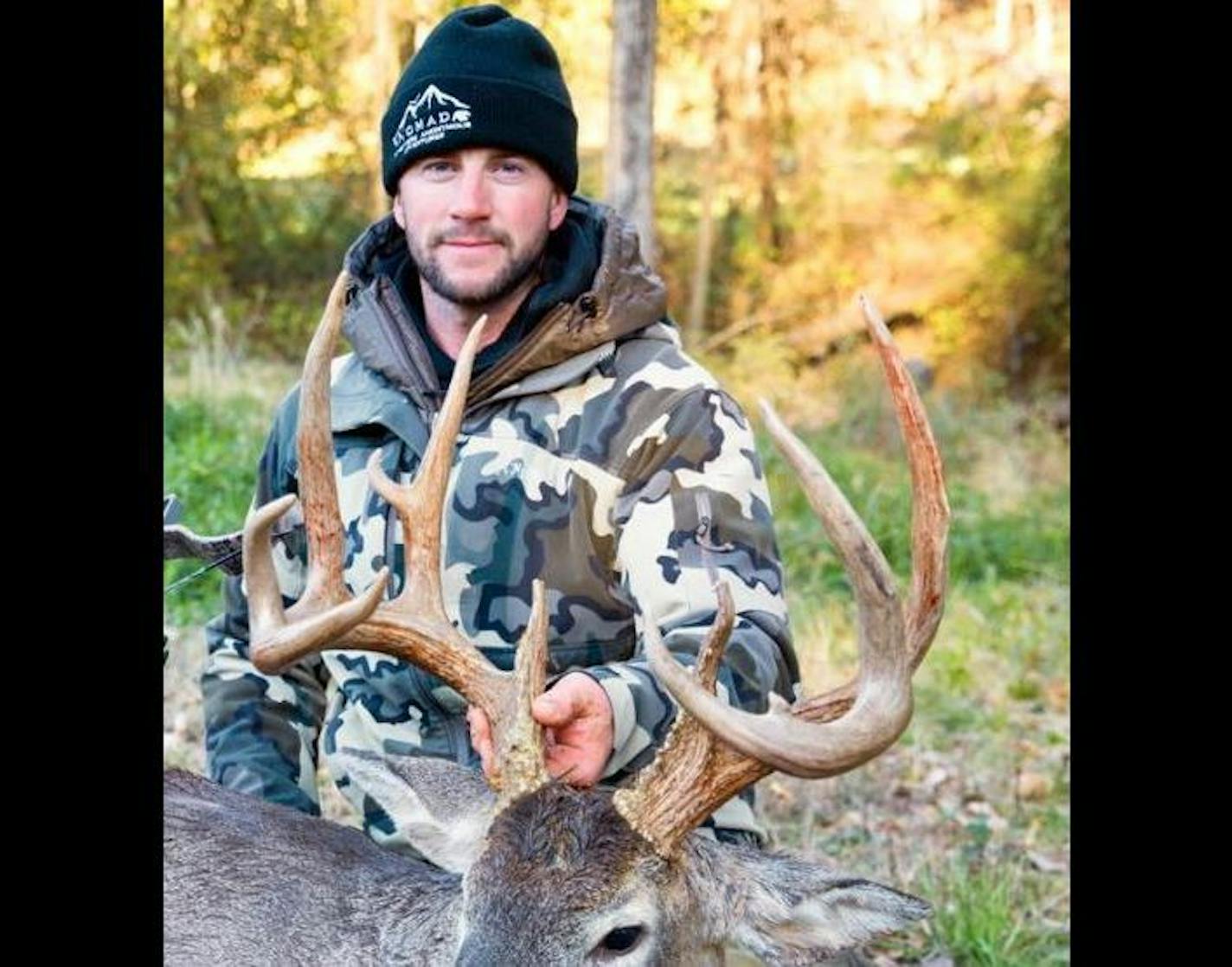 Travis Pineur, with a trophy he bagged.