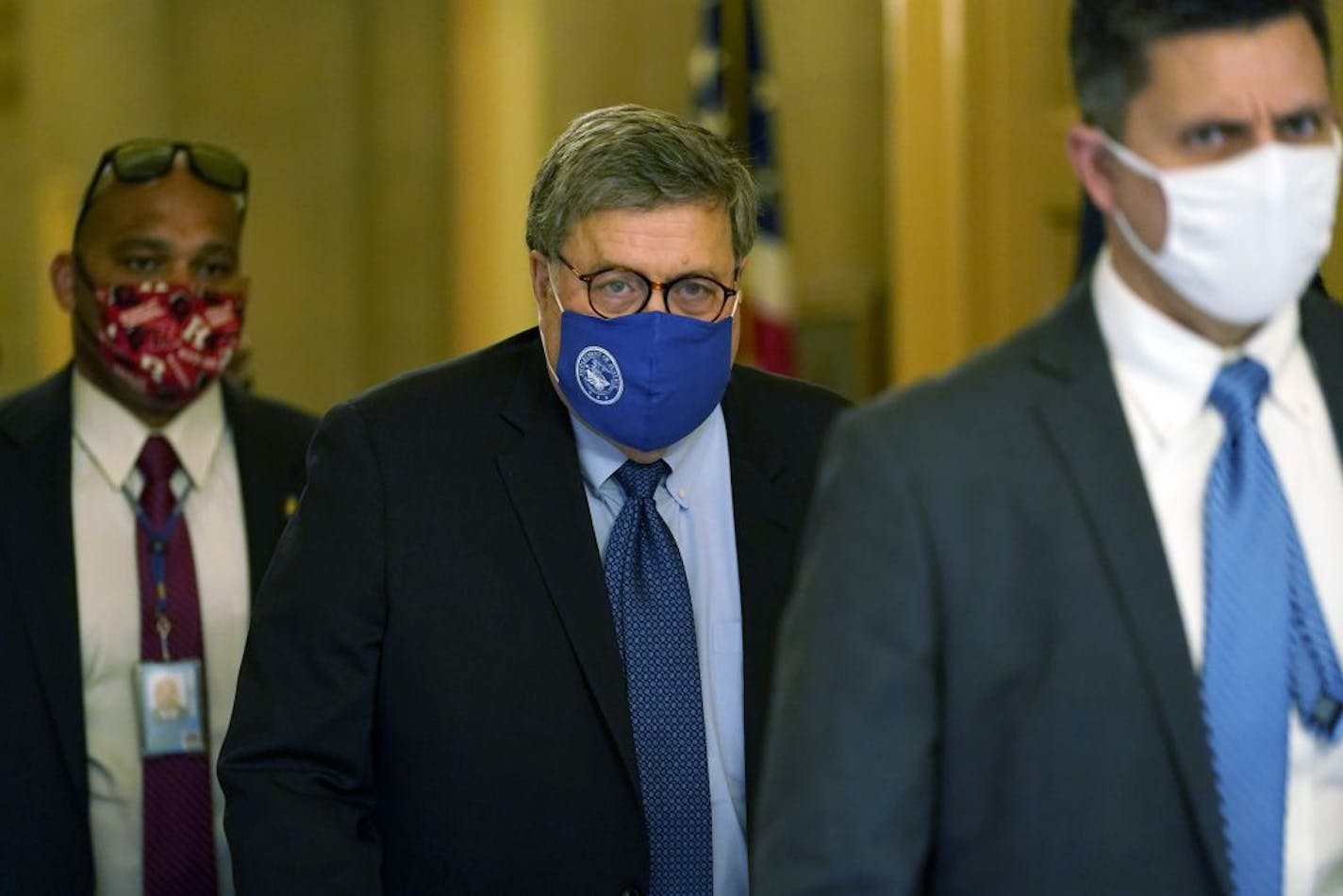 Attorney General William Barr leaves the office of Senate Majority Leader Mitch McConnell of Ky., on Capitol Hill in Washington, Monday, Nov. 9, 2020.