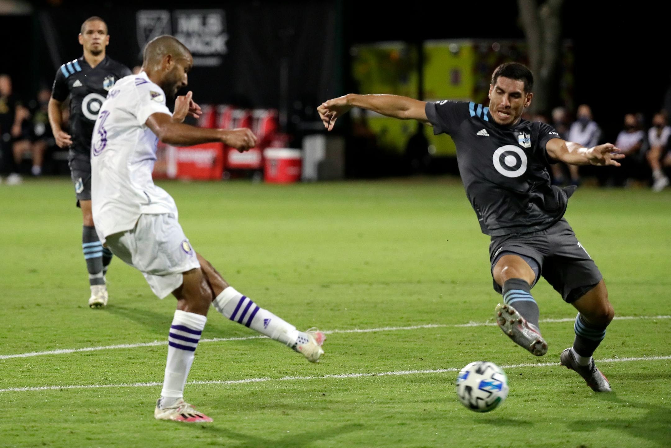Defender Michael Boxall (right, shown against Orlando City in August) and his Minnesota United teammates have had to deal with a 2020 season full of injuries, absences, testings and postponements because of the coronavirus pandemic.