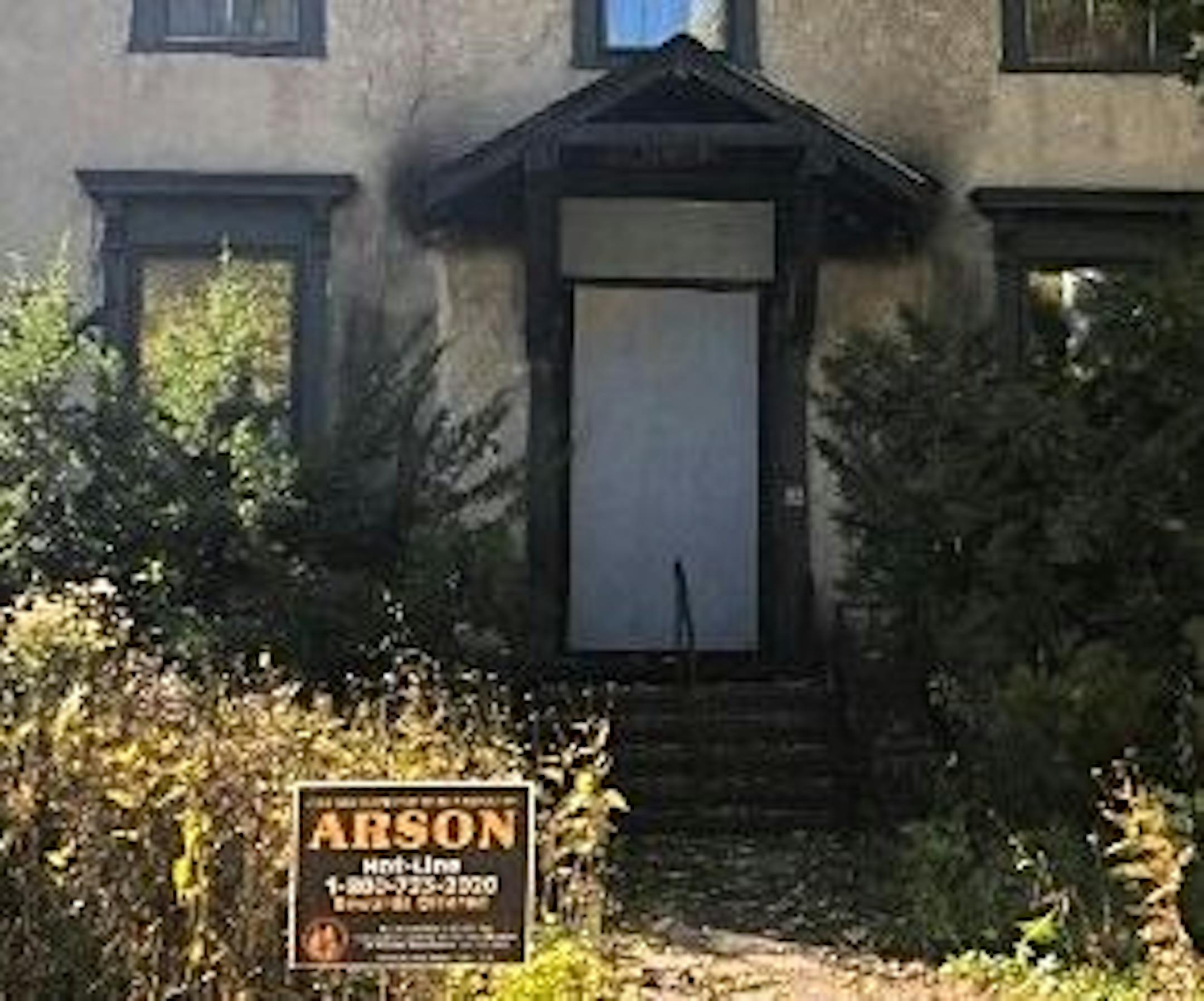 Arson is suspected in a fire that was set at the front door of this Minneapolis house.