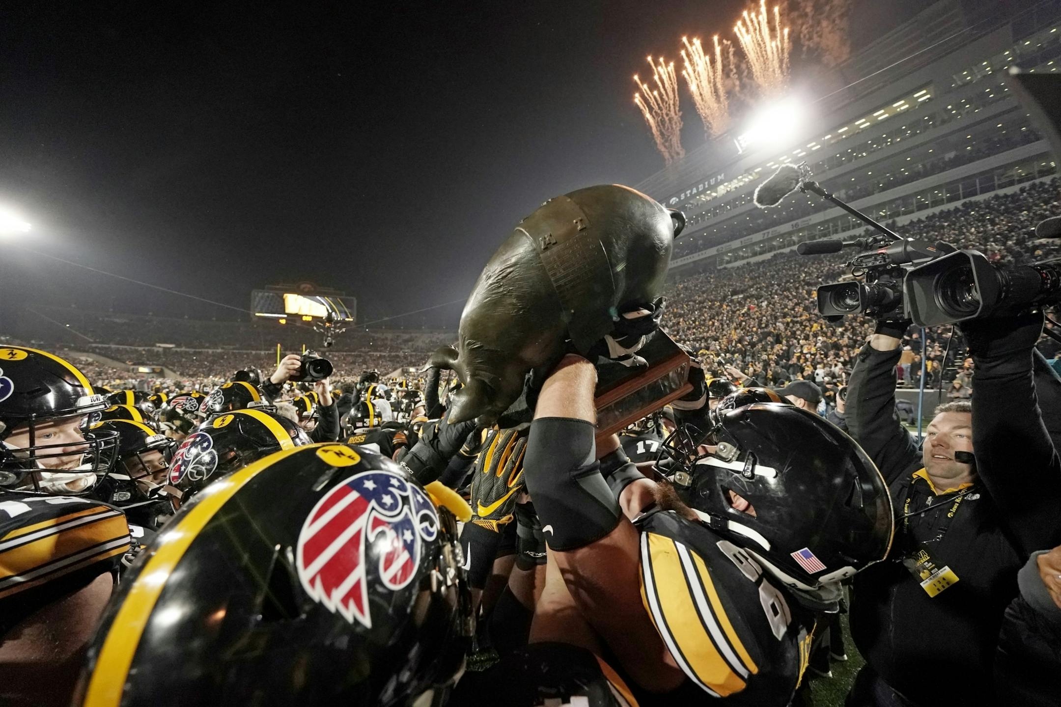 Iowa Hawkeyes players and fans celebrated last year as they claimed the Floyd of Rosedale. Iowa beat the Gophers 23-19.