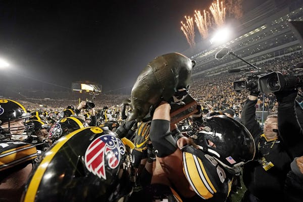 Iowa Hawkeyes players and fans celebrated last year as they claimed the Floyd of Rosedale. Iowa beat the Gophers 23-19.