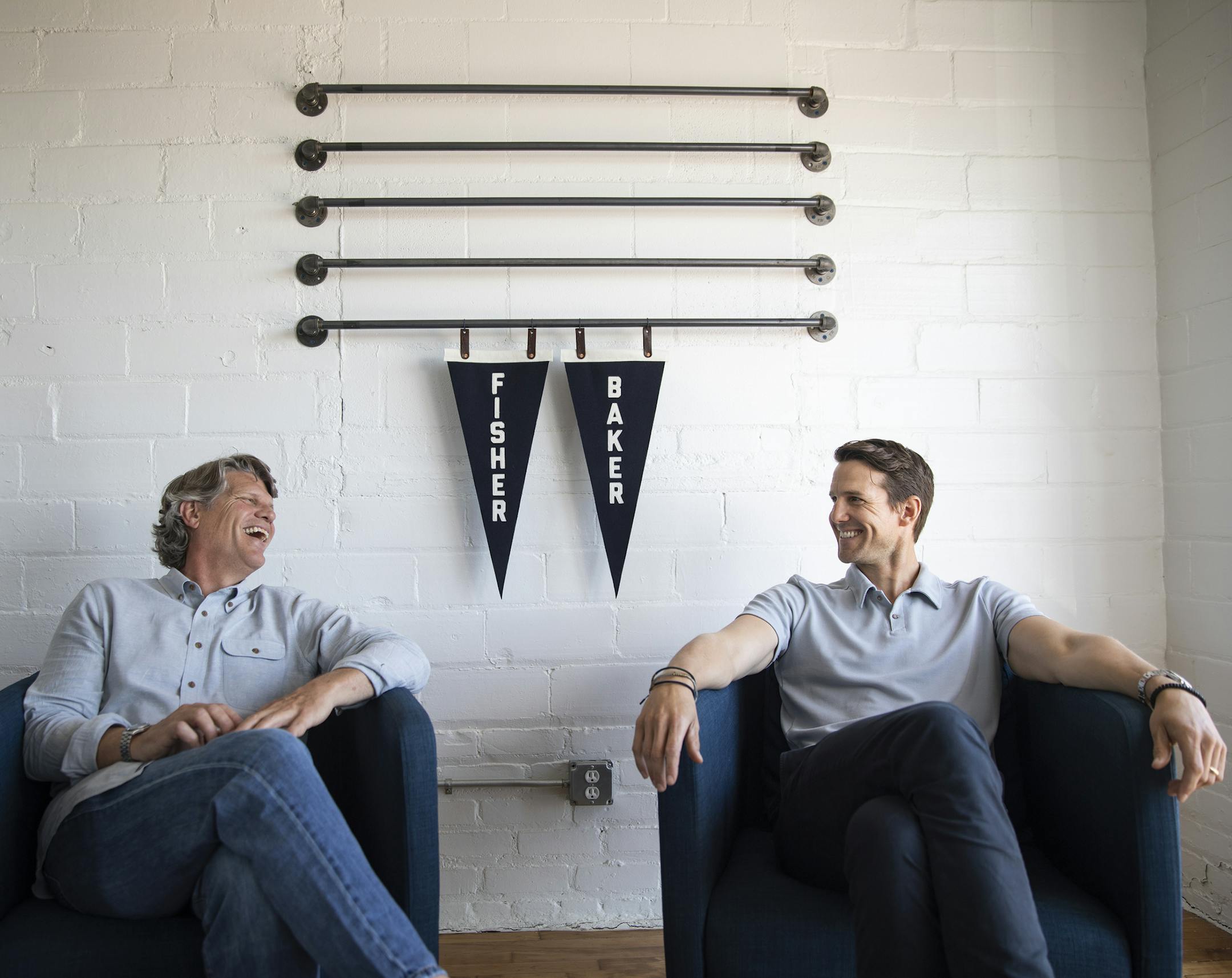 Greg Horvitz, right, and Mike Arbeiter pose for a photo in the Fisher + Baker Minneapolis showroom. ] LEILA NAVIDI &#xef; leila.navidi@startribune.com BACKGROUND INFORMATION: Greg Horvitz and Mike Arbeiter pose for a photo in the Fisher + Baker Minneapolis showroom on Friday, June 1, 2018. Horvitz and Arbeiter, a former furniture maker and a marketing guru respectively, have joined forces to create an untapped niche in high-tech menswear, clothes you can bike to the office in.