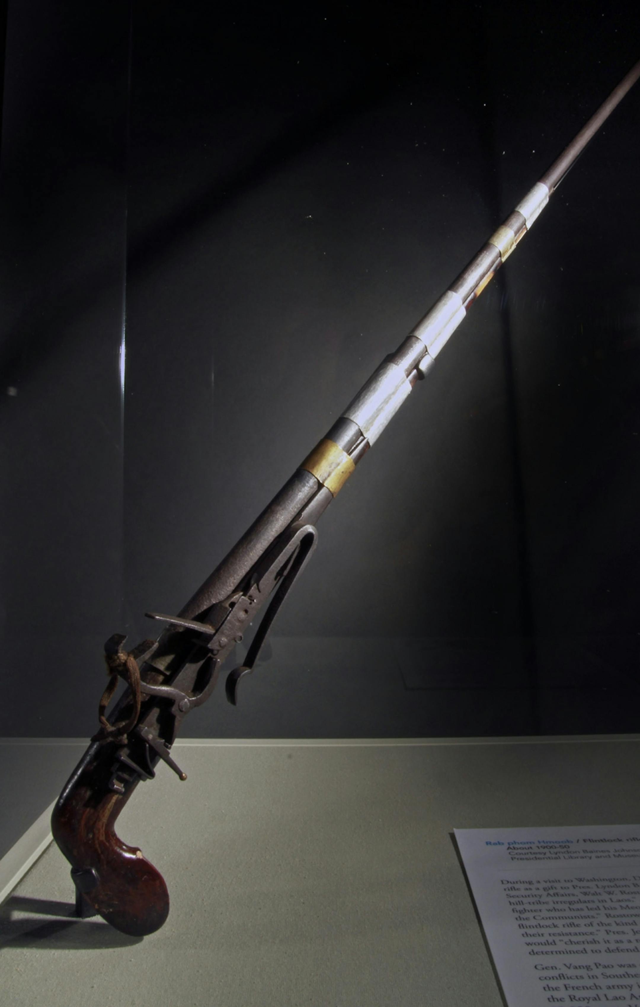 Hmong in Minnesota exhibit at the Minnesota History Center - artifact - a 'rifle' presented to President Lynndon Johnson -Flintlock rifle, courtesy Lyndon Baines Johnson Presidential Library and Museum, Austin, Texas