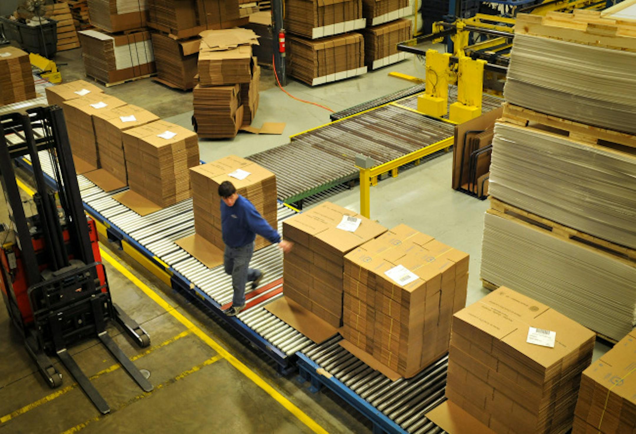 Central Container owner Jim Hagland recently added equipment and 10 employees to keep up with demand at his Brooklyn Park company.