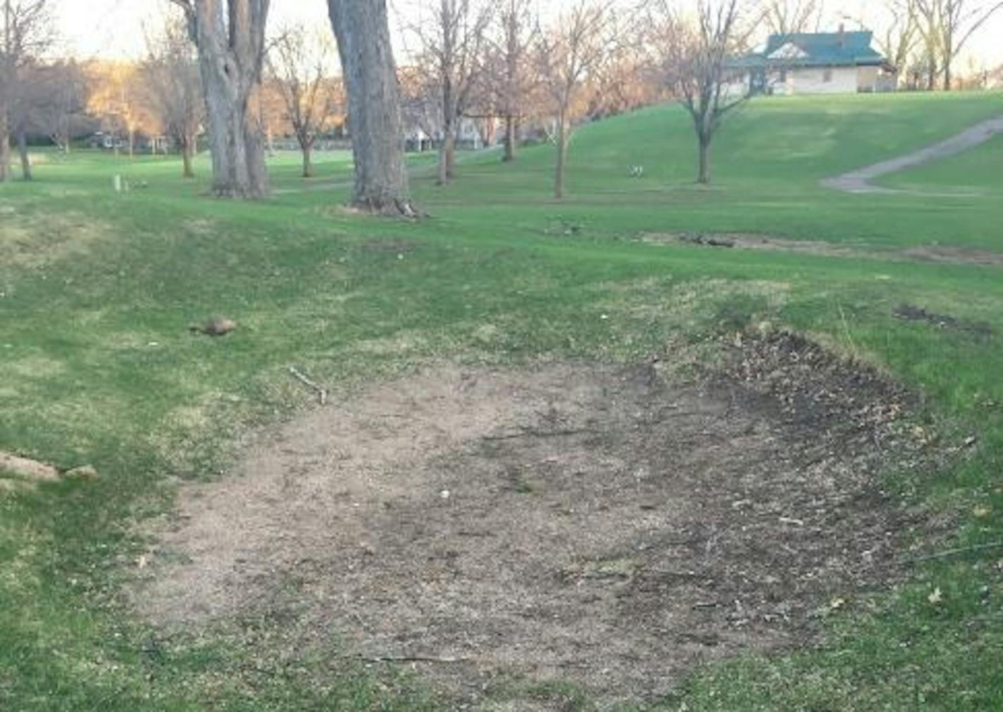 A sand trap in need of repairs at Meadowbrook Golf Club, which was damaged by heavy rains in 2014.