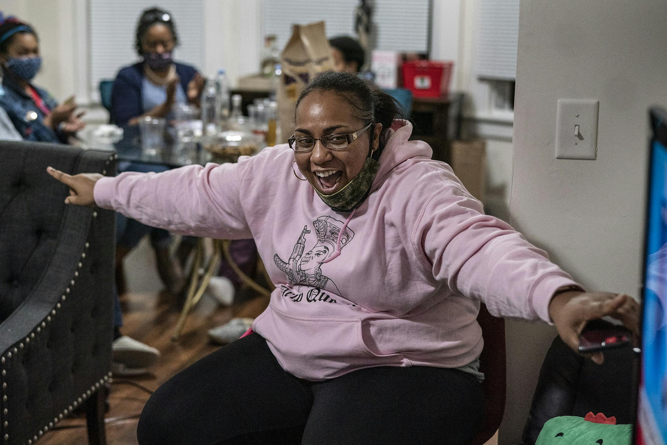 Amber Brown, of Minneapolis reacted after CNN posted that Joe Biden had reached 192 electoral votes with small group Black women gathered in St. Paul to watch the results of the 2020 election and witness the possibility of Kamala Harris becoming the first Black woman to become vice president. ] Jerry Holt •Jerry.Holt@startribune.com A group of Black Women gathered in a home to watch the 2020 election results . For the the first in history Kamala Harris a Black woman has a chance to vice presiden