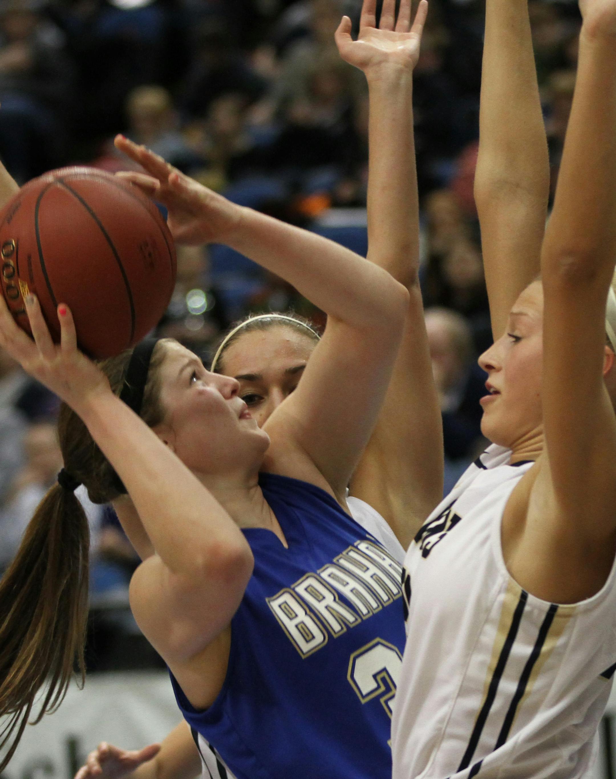 State Girls Basketball Tournament, Class 2A Semifinals, Providence Academy vs Braham. (left to right) Braham's Dani Braund drove on Providence Academy's Makenzie Murtha for a rebound.] Bruce Bisping/Star Tribune bbisping@startribune.com Dani Braund, Makenzie Murtha/roster.