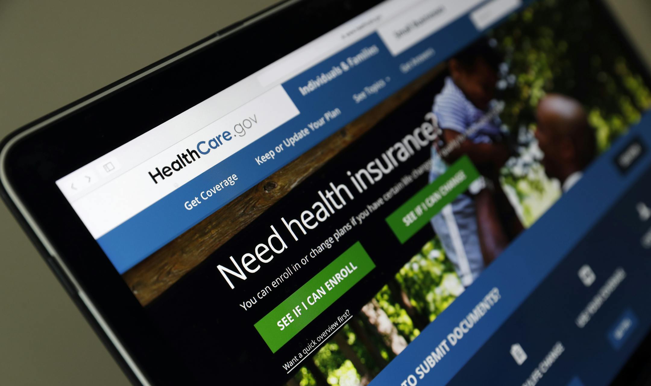 FILE - In this May 18, 2017 file photo, the Healthcare.gov website is seen on a laptop computer, in Washington. Former Obama administration officials say they're launching a private campaign to encourage people to sign up for coverage next year under the Affordable Care Act. With the start of open enrollment just weeks away on Nov. 1, the Trump administration has slashed "Obamacare's" ad budget, as well as grants to outside organizations that are supposed to help consumers sign up. (AP Photo/Ale