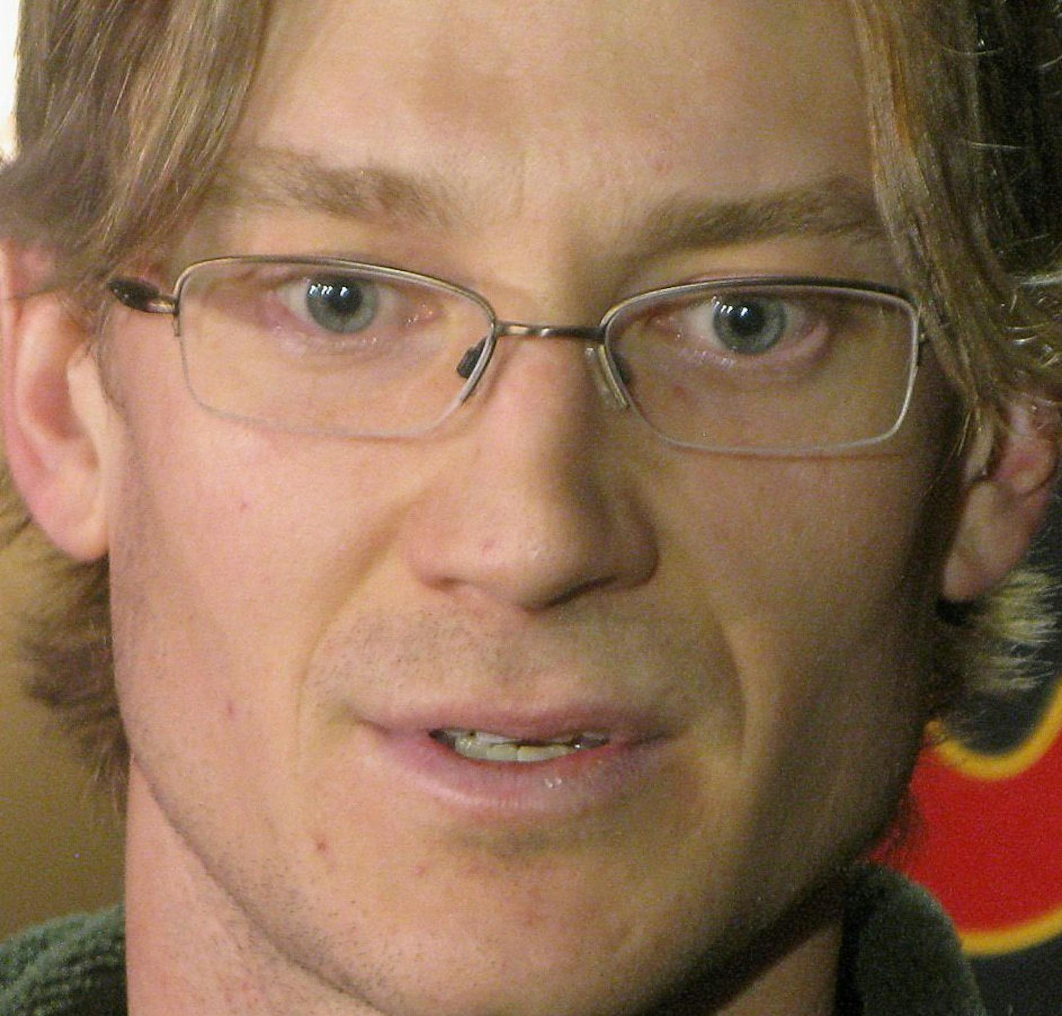 Defenseman Jay Bouwmeester speaks to reporters during an NHL hockey news conference in Calgary, Alberta. on Tuesday, April 2, 2013. The Calgary Flames continued to usher big names out the door with the trade of Bouwmeester to the St. Louis Blues on Monday. (AP Photo/The Canadian Press, Bill Graveland) ORG XMIT: MIN2013040514315133