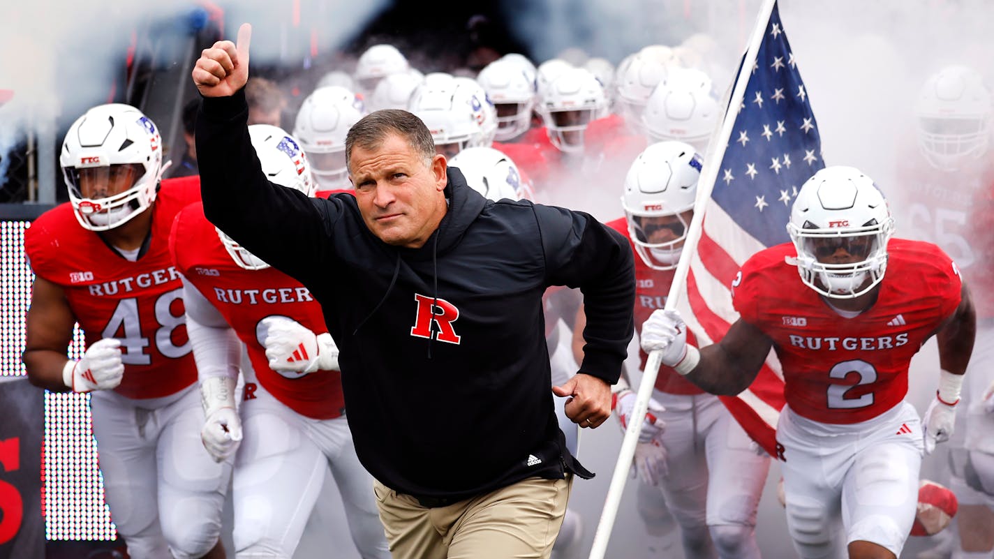 Rutgers head coach Greg Schiano enters the stadium for a NCAA college football game against Ohio State, Saturday, Nov. 4, 2023, in Piscataway, N.J. (AP Photo/Noah K. Murray)