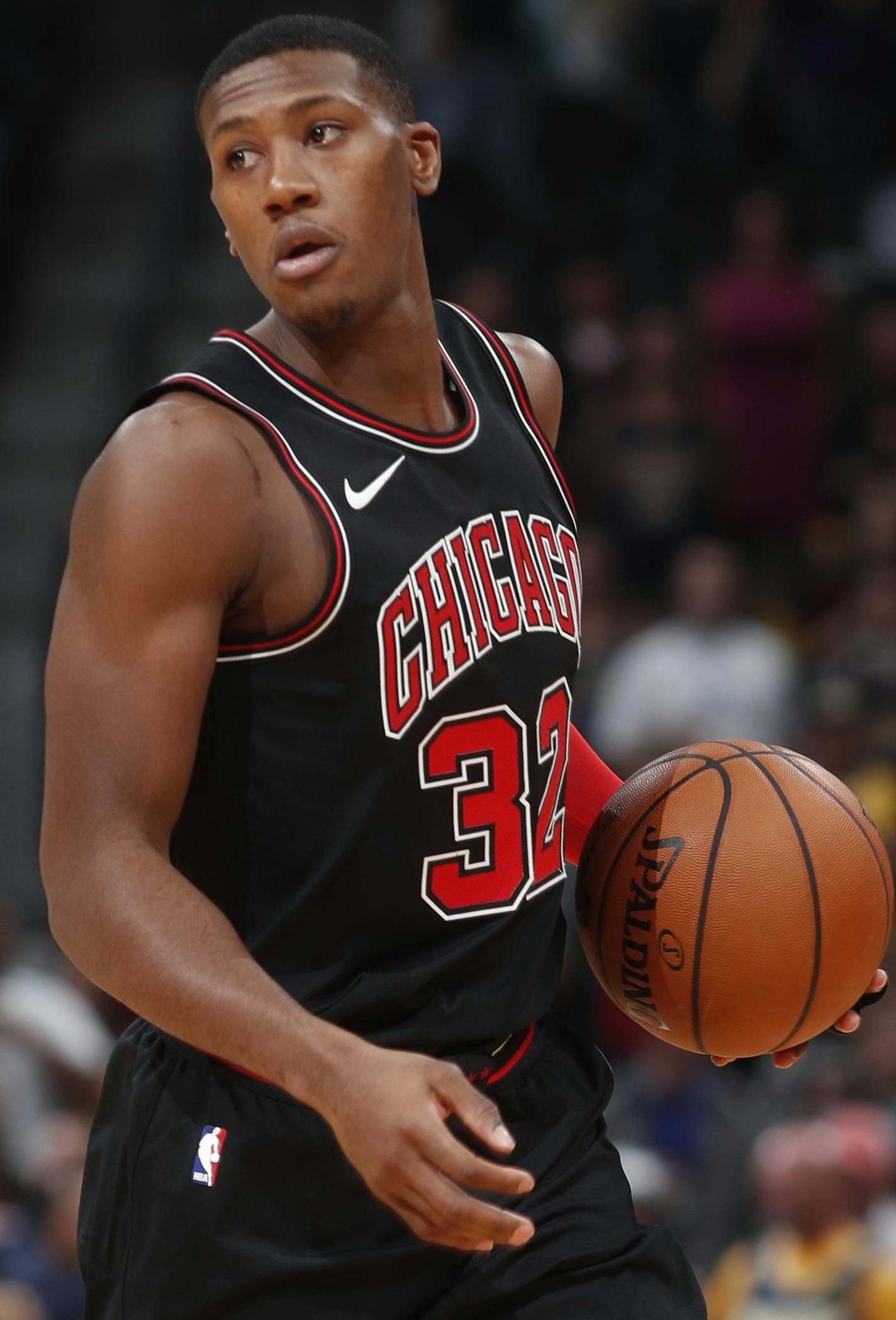 Chicago Bulls guard Kris Dunn (32) in the first half of an NBA basketball game Thursday, Nov. 30, 2017, in Denver. (AP Photo/David Zalubowski) ORG XMIT: OTKDZ113