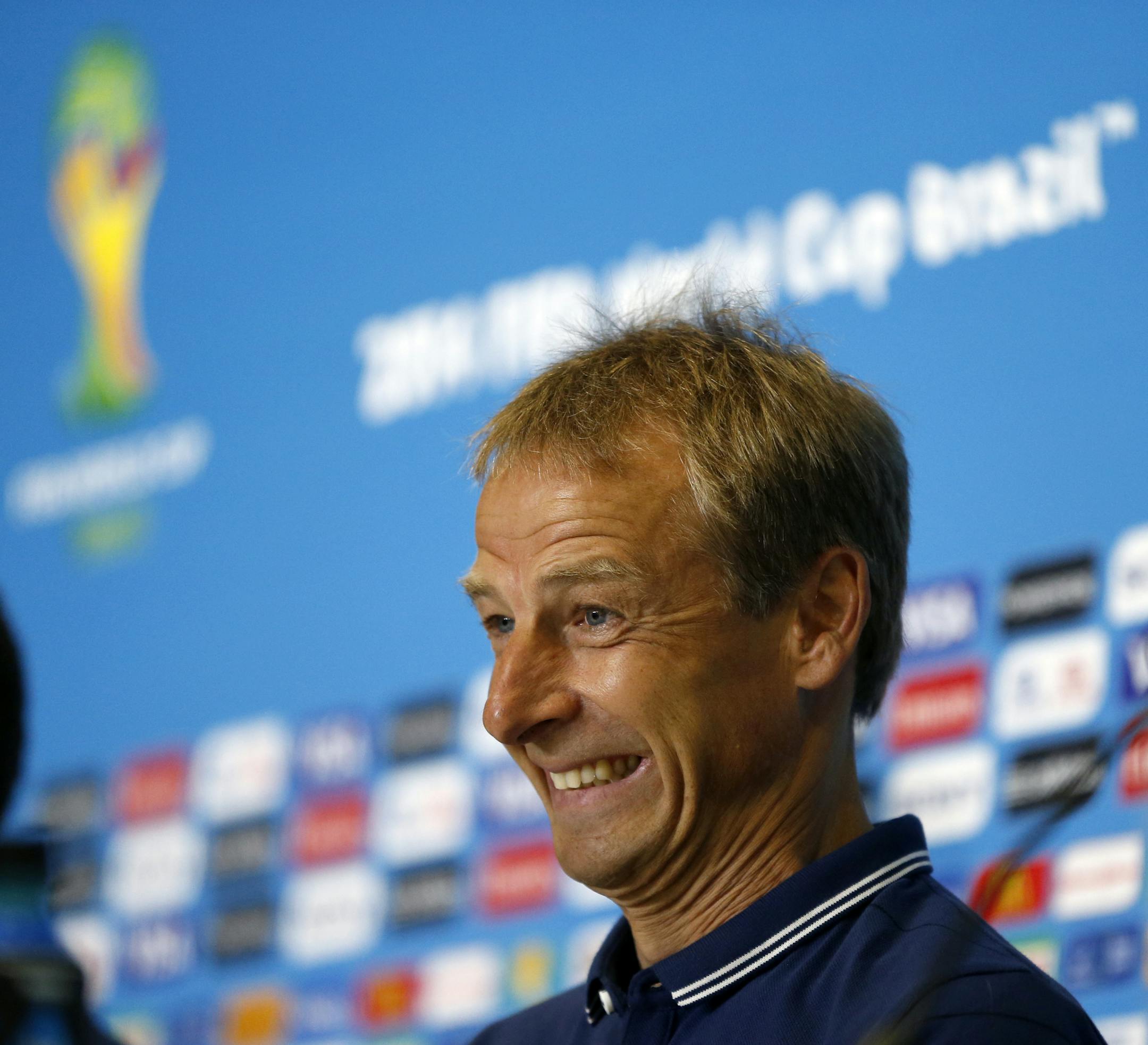 United States' head coach Jurgen Klinsmann reacts during a news conference before an official training session the day before the group G World Cup soccer match between Ghana and the United States at the Arena das Dunas in Natal, Brazil, Sunday, June 15, 2014. (AP Photo/Julio Cortez)