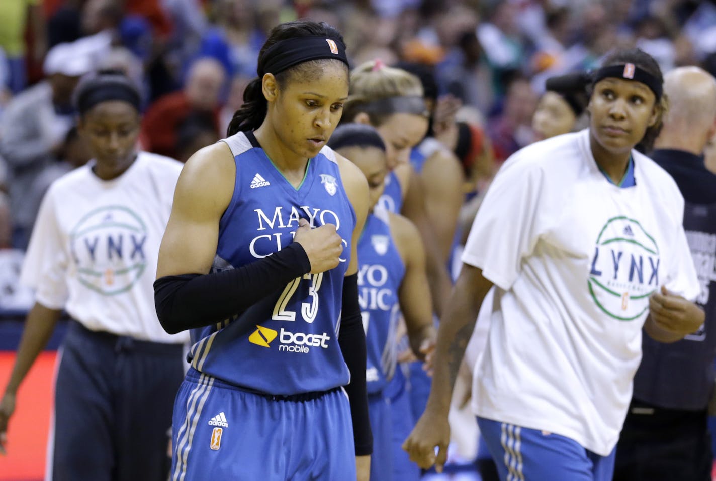 Minnesota Lynx's Maya Moore walks off the court after the Minnesota's 75-69 loss to the Indiana Fever in Game 4 of the WNBA Finals basketball series, in Indianapolis, Sunday, Oct. 11, 2015. The Fever defeated the Lynx tied the series and force Game 5 on Wednesday in Minneapolis. (AP Photo/Michael Conroy)