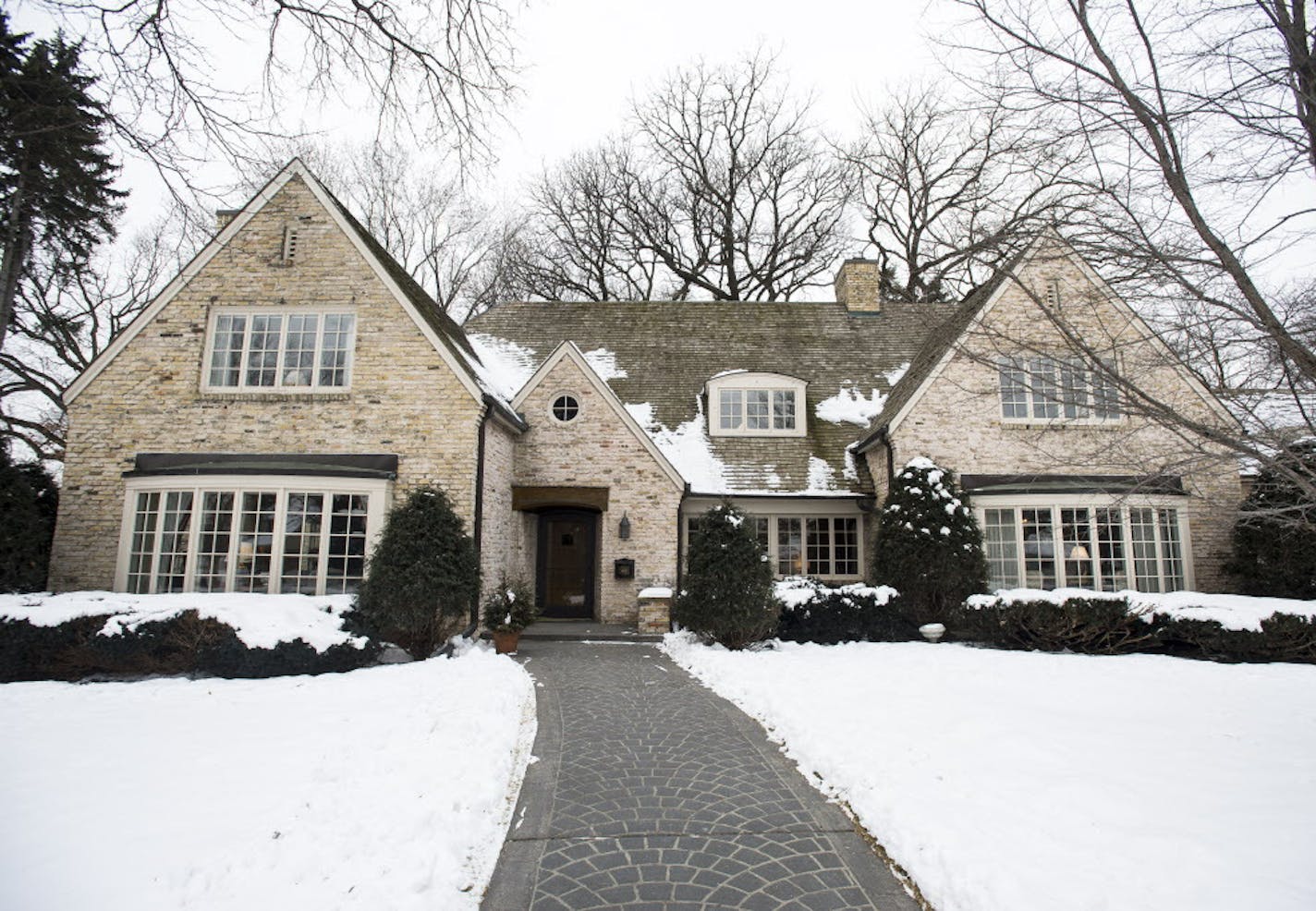 Kate Helm's home in Edina, which she is putting up for sale. ] (AARON LAVINSKY/STAR TRIBUNE) aaron.lavinsky@startribune.com 2015 was the third strongest year for house prices in the Twin Cities, but prices rose to record highs in several metro area communities during the year. Chad Larsen, a real estate agent with the Berg Larsen Group, met with Kate Helms, who is listing her house for sale in Edina, which was one of the hottest markets in the metro last year. We photograph the meeting on Tuesda