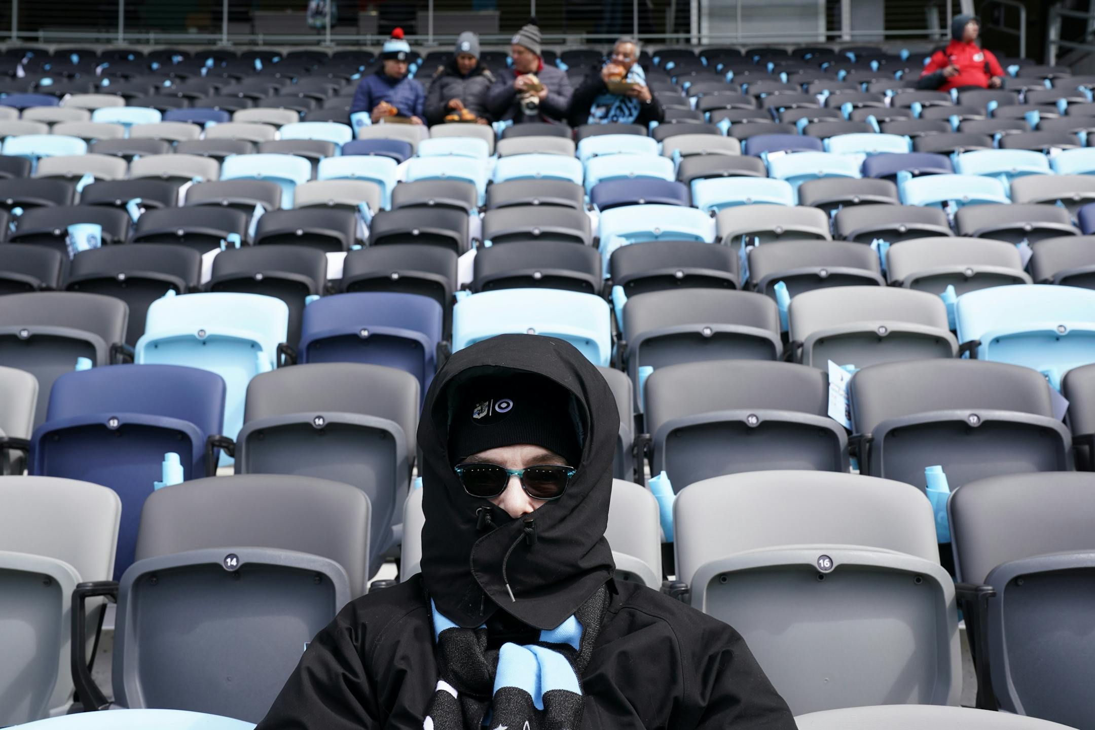 Prudence Fagerstrom of Richfield sat bundled up in the stands ahead of Saturday's Minnesota United home opener at Allianz Field.