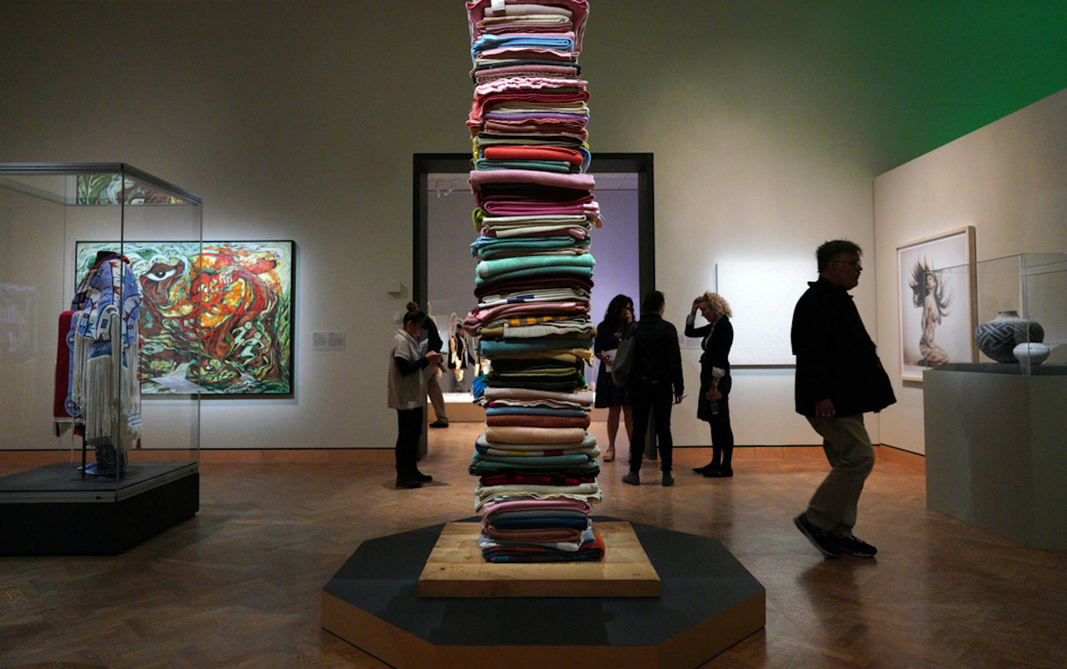 "Give Away Horses" by Growing Thunder, left, and "Blanket Stories" by Marie Watt, right.