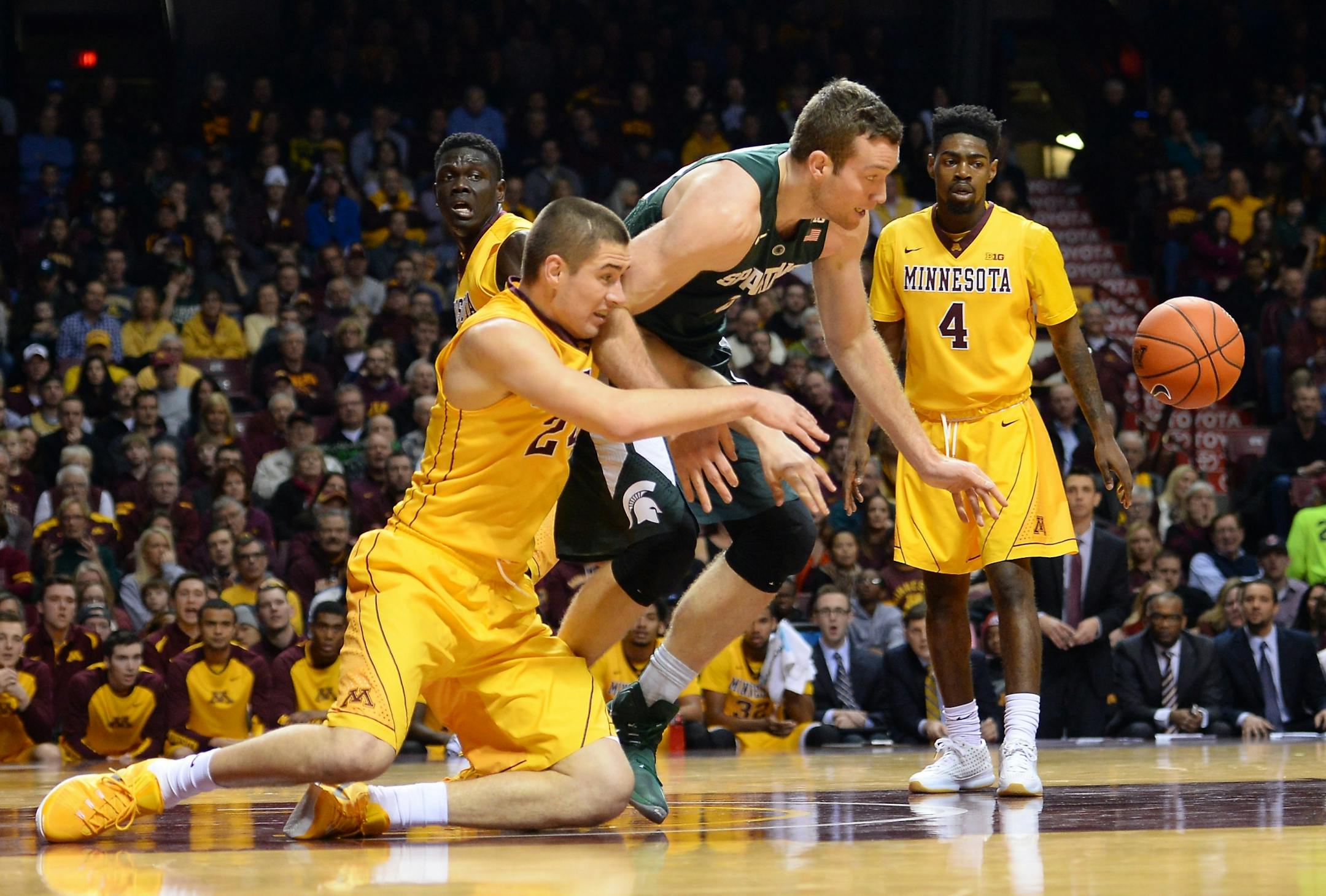 Gophers forward Joey King, left, still leads the team in scoring with 12.8 points a game, but he has been in a shooting slump.