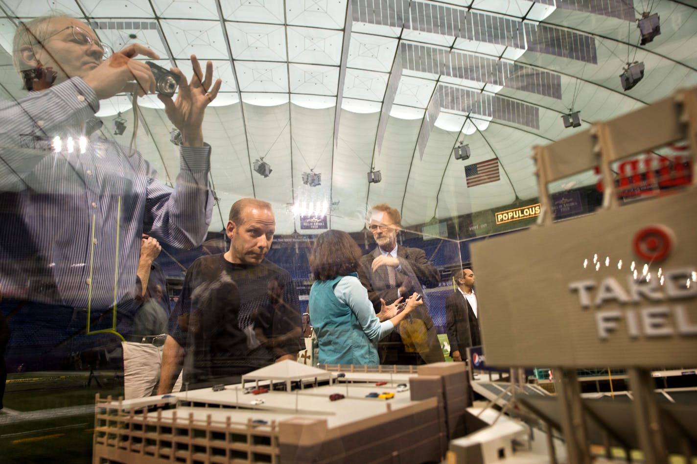 In this file photo, he five architectural firms bidding to win the design job for the new Vikings stadium showed some of their past projects in the Metrodome Thursday, September 6, 2012.