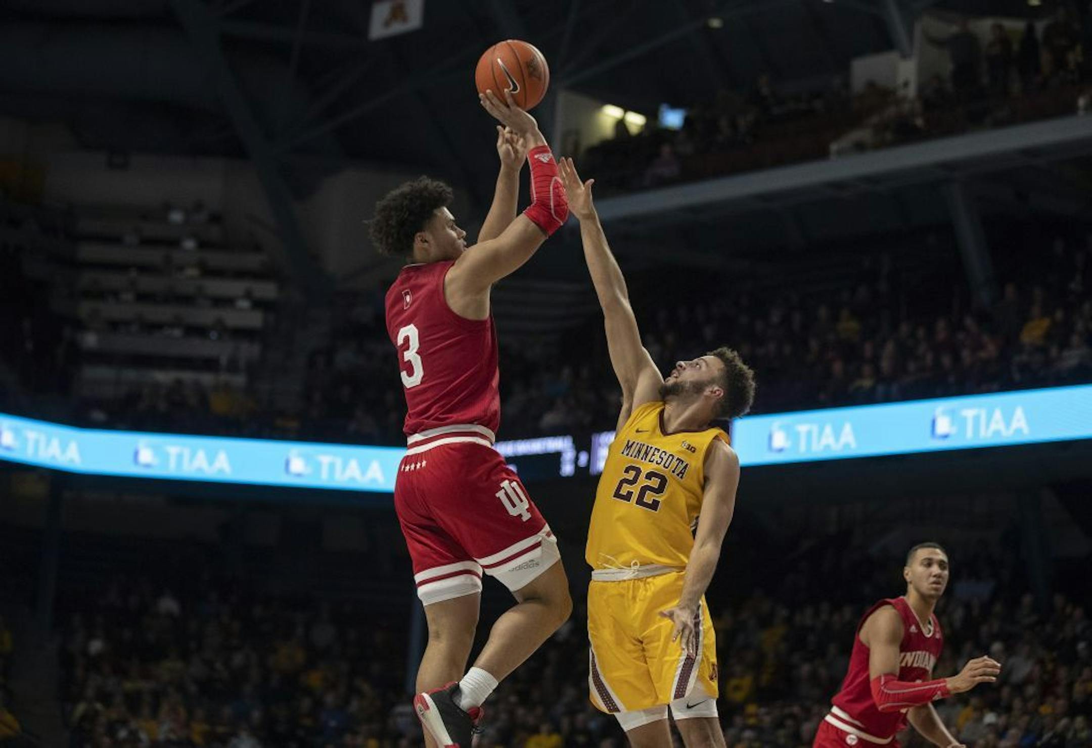 Indiana Hoosiers forward Justin Smith (3) scored on a jump shot over Minnesota Gophers guard Gabe Kalscheur (22) in the second half.