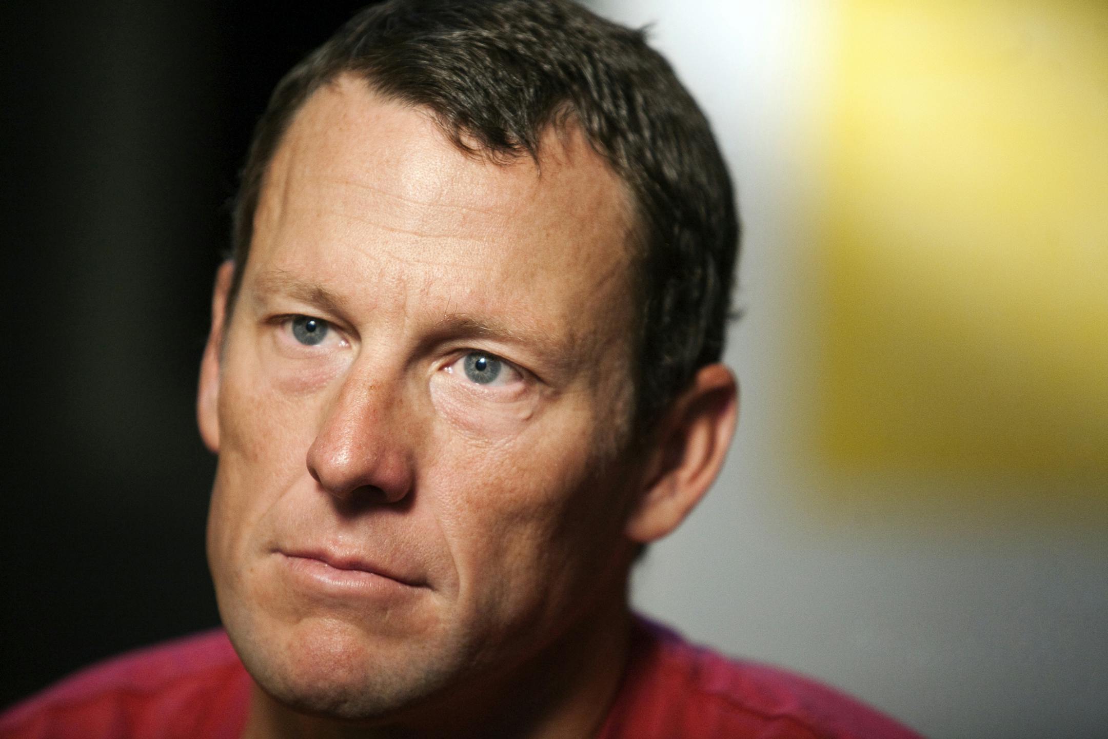 FILE - In this Feb. 15, 2011, file photo, Lance Armstrong pauses during an interview in Austin, Texas. Armstrong has given sworn testimony naming several people he says knew about his performance-enhancing drug use. (AP Photo/Thao Nguyen, File)