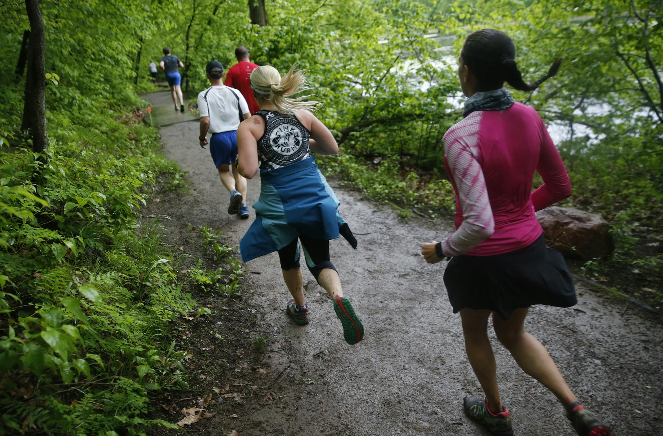 At the Lebanon 10K trail race held at Lebanon Hills Park, the participants are off and running on the scenic trail by Jensen Lake .] Richard Tsong-Taatarii/rtsong-taatarii@startribune.com