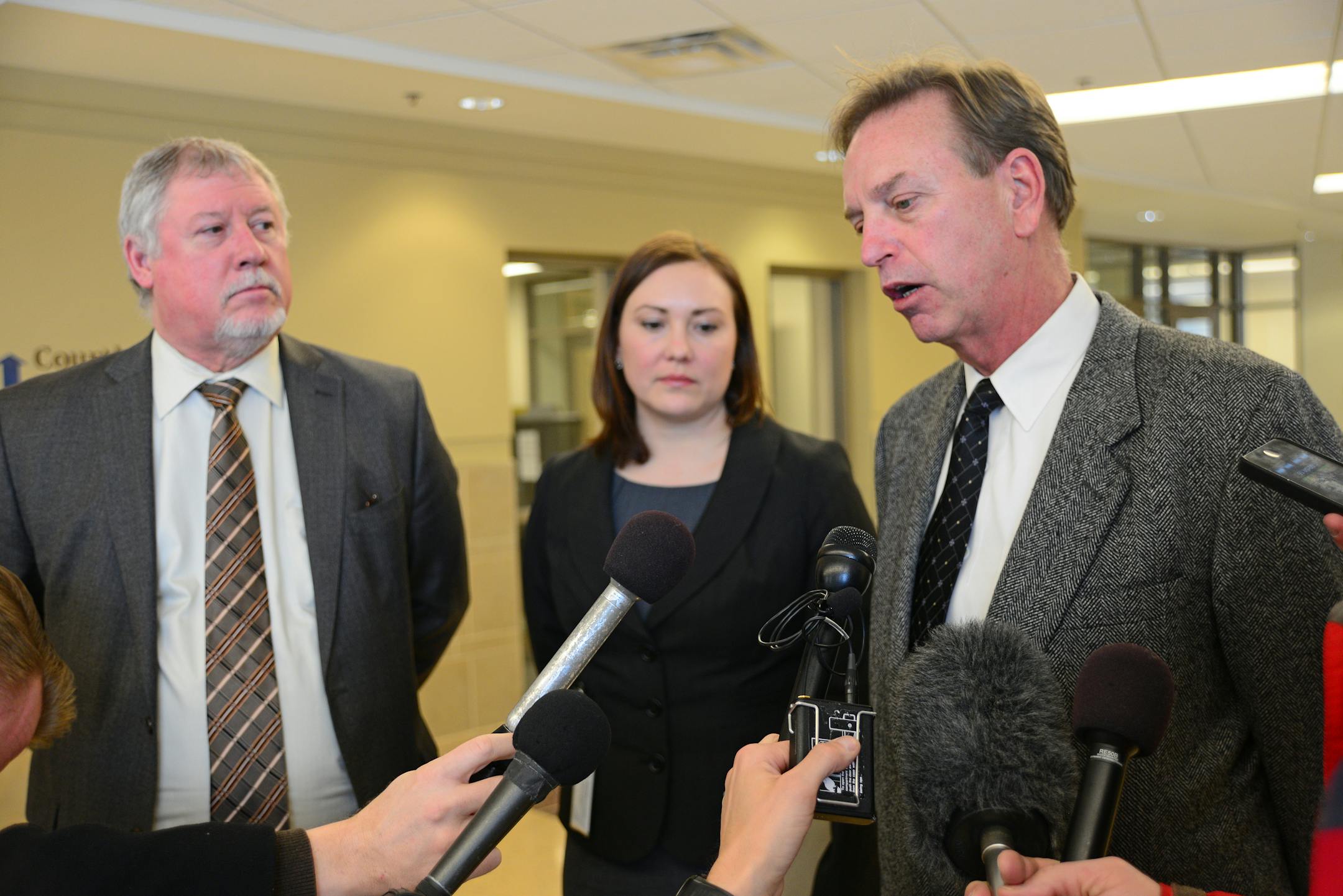 Nhan L. Tran was charged with six felony counts Wednesday in Washington County District Court. The six charges stem from a shooting spree that killed 9-year-old Devin Aryal.