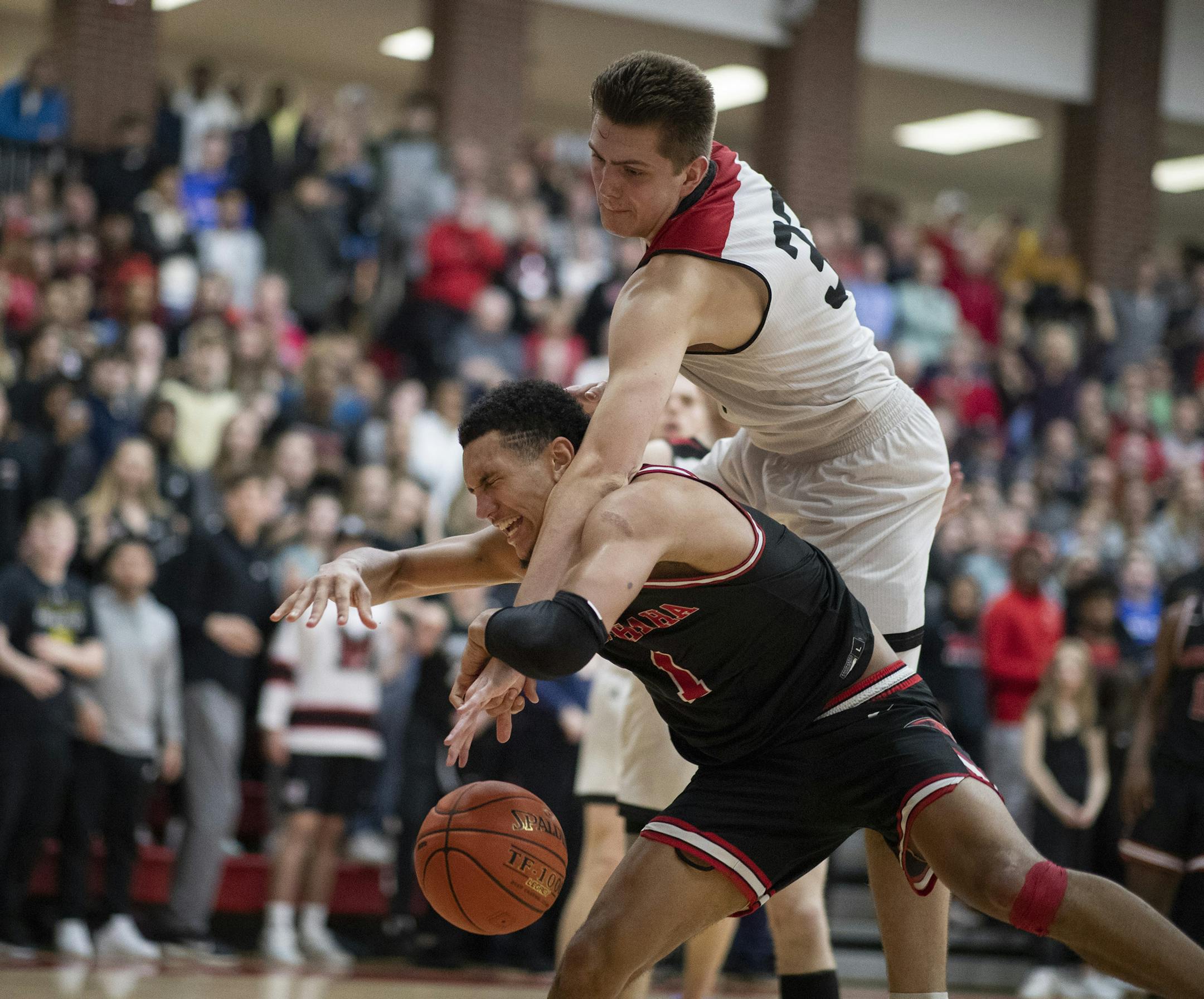Austin Andrews of Eden Prairie fouled Jalen Suggs of Minnehaha Academy in the second half .] Jerry Holt •Jerry.Holt@startribune.com Eden Prairie defeated Minnehaha Academy 78-64 February 18, 2020 in Minneapolis, MN.