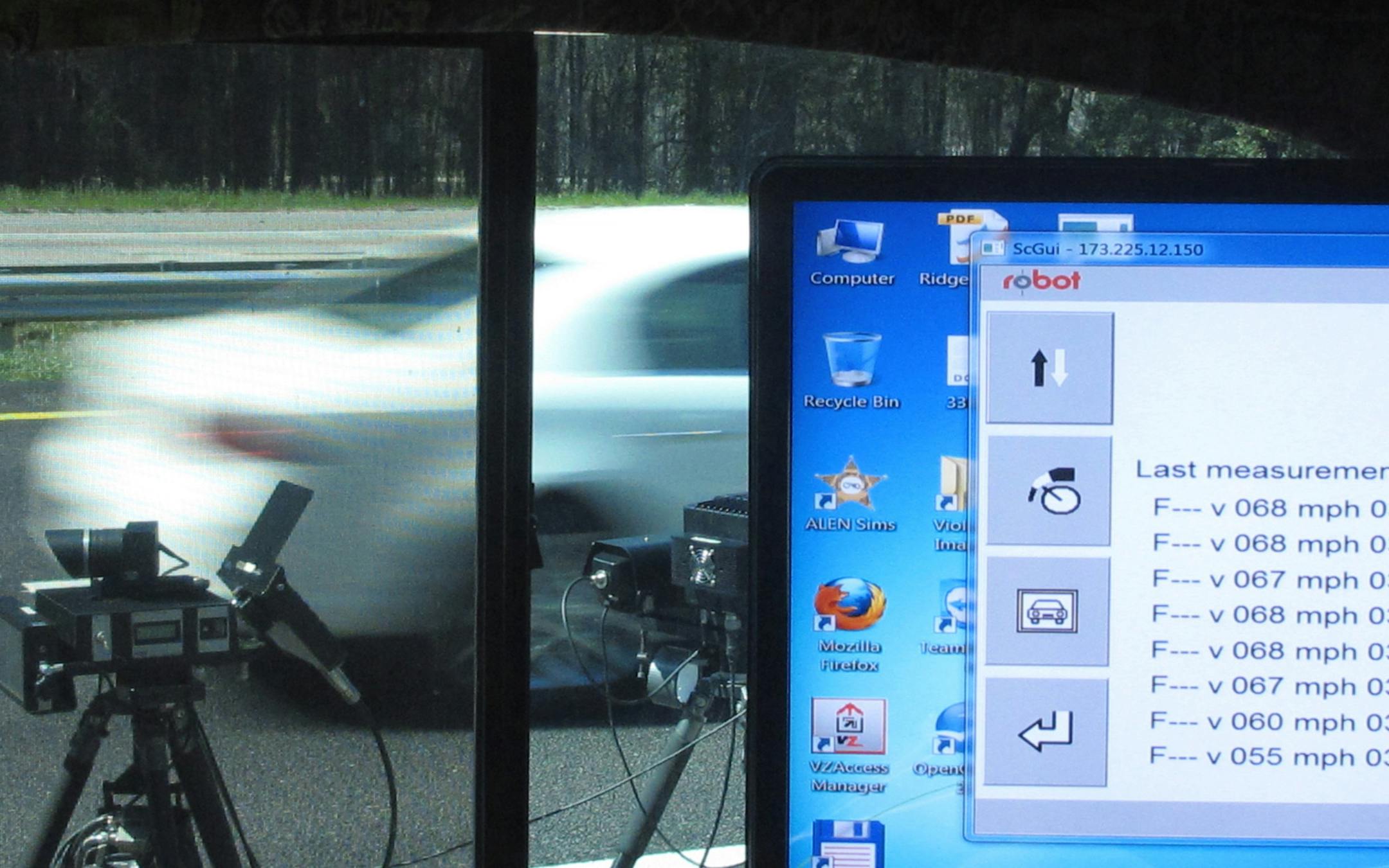 In this March 8, 2011 photo, a speed camera system records the speed of a passing car on Interstate 95 in Ridgeland, S.C. The cameras in Ridgeland have spotted thousands of speeding motorists and won accolades from highway safety advocates. But they've also attracted opposition from state lawmakers and sparked a federal court challenge. (AP Photo/Bruce Smith)