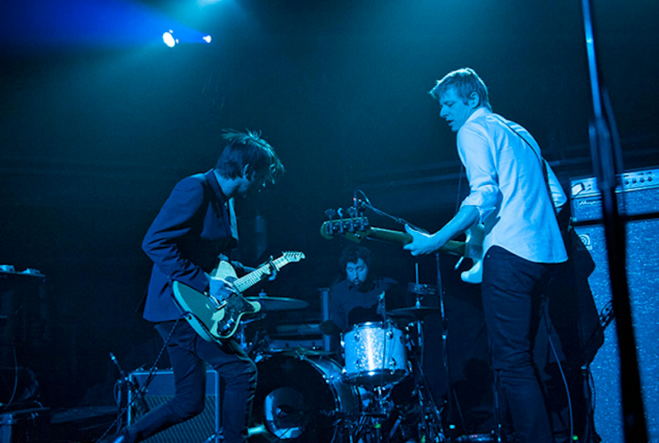 Dan Boeckner, left, and Britt Daniel swapped guitars and vocal duties throughout Divine Fits' concert Thursday at the Varsity Theater. / Photos by Leslie Plesser