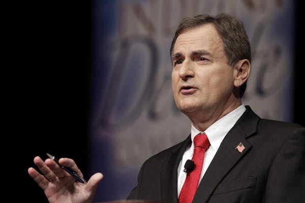 Republican Richard Mourdock, candidate for Indiana's U.S. Senate seat, participates in a debate with Democrat Joe Donnelly and Libertarian Andrew Horn