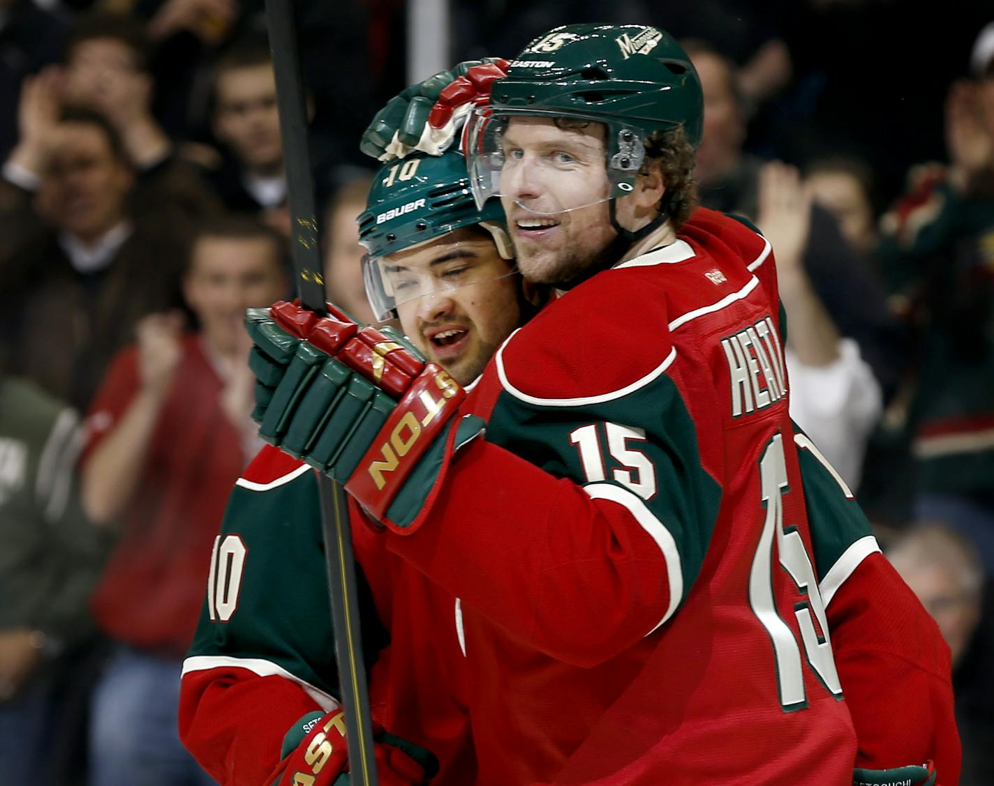 Devin Setoguchi (10) and Dany Heatley (15) celebrated Setoguchi's power play goal in the first period. ] CARLOS GONZALEZ cgonzalez@startribune.com - March 12, 2013, St. Paul, Minn., Xcel Energy Center, NHL, Minnesota Wild vs. Anaheim Ducks