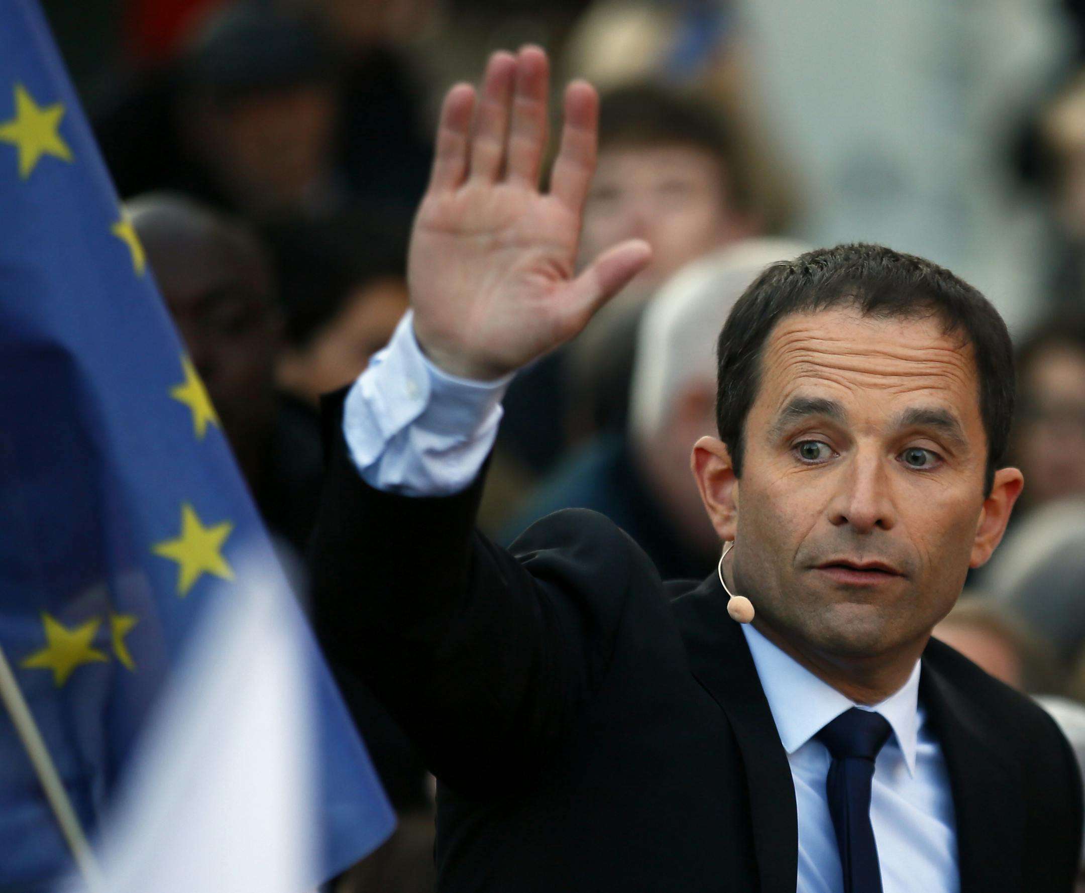 French Socialist presidential candidate Benoit Hamon waves to supporters during a last-ditch rally and concert in Paris, Wednesday, April 19, 2017. Hamon is polling a distant fifth place ahead of Sunday's first-round election and has little chance of reaching the decisive May 7 runoff. (AP Photo/Francois Mori)