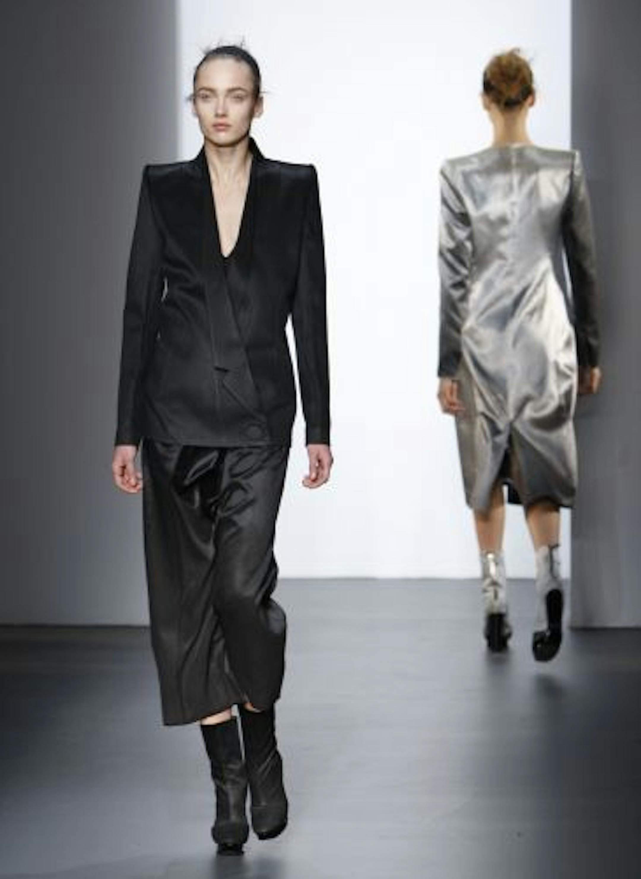 This Feb. 19, 2009 file photo shows models walking the runway during the presentation of the Calvin Klein fall 2009 collection in New York.