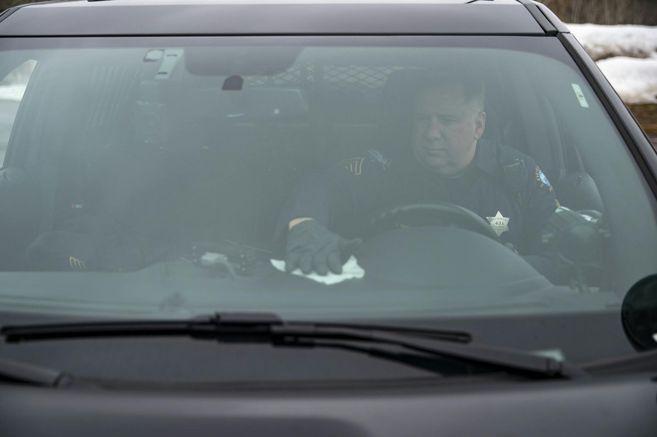 Duluth police sergeant Steven Ring disinfected his squad car after his shift on Thursday. ]
ALEX KORMANN • alex.kormann@startribune.com The Duluth Police Department has taken special measures to help protect their officers and the public from COVID-19 including disinfecting all squad cars at the start and end of every shift.